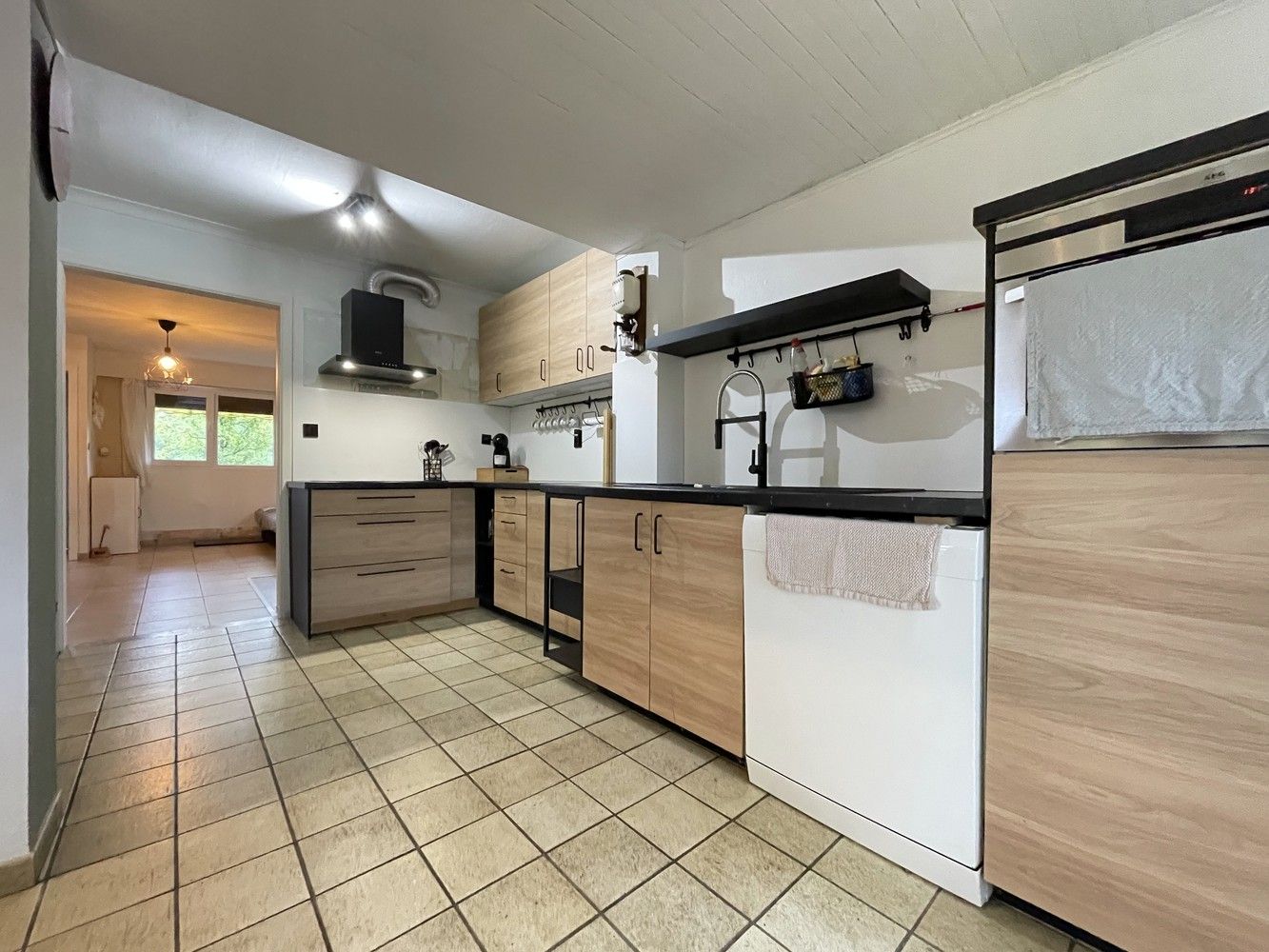 Knusse split-level woning op nagenoeg 27 are grond foto 11