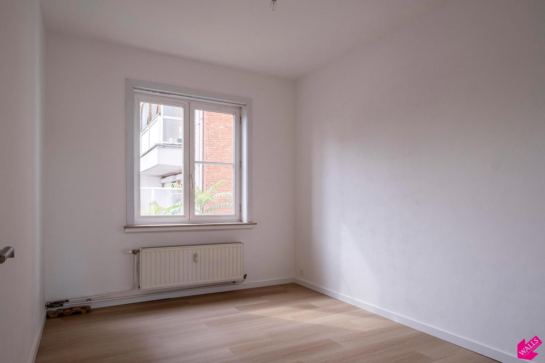 Vernieuwd en centraal gelegen 2-SLK appartement! foto 7