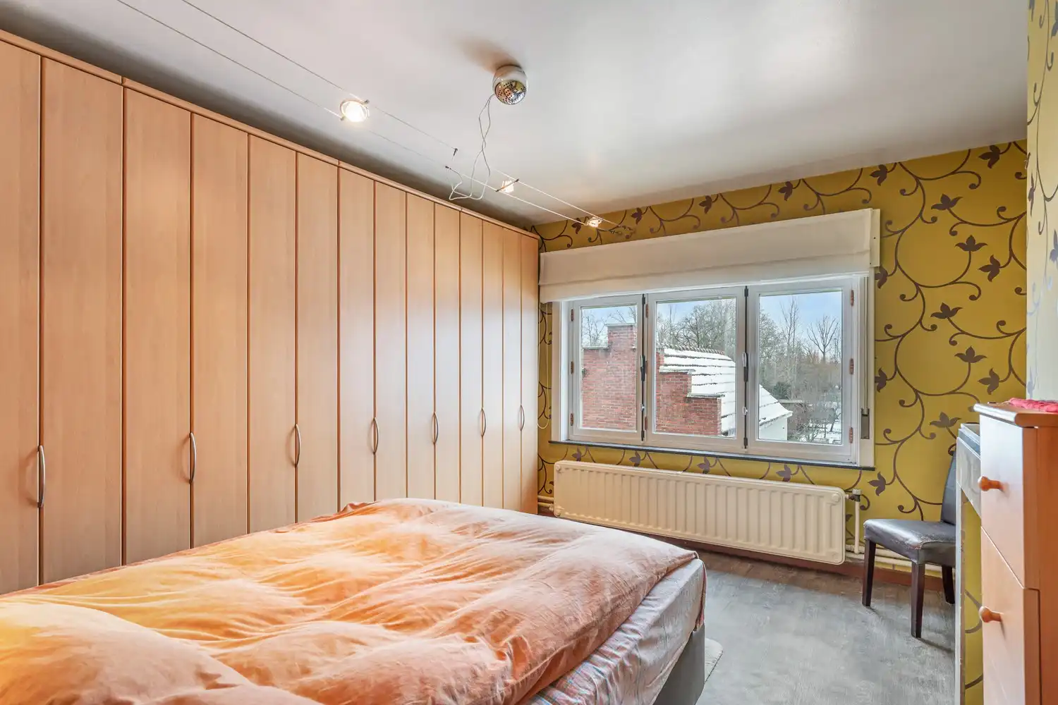 Goed gelegen en vrijstaande woning met 2 slaapkamers, uitbreidingsmogelijkheden onder het dak en een oprit met een garage op een perceel van 9a 96ca grenzend aan en met de tuin deels gelegen in agrarisch gebied! foto 16