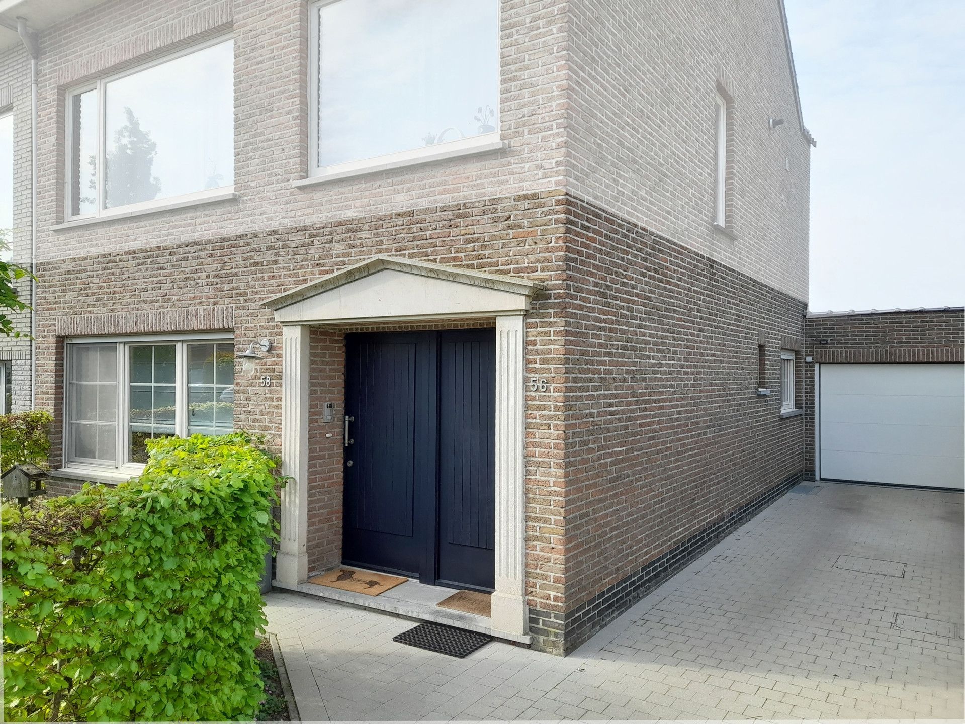 Prachtig 2-slpk-appartement met garage, terras en tuin  foto 2