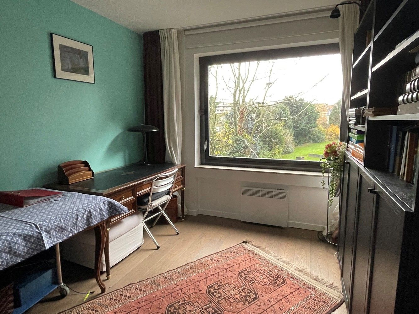 Gerenoveerd 3 slaapkamer appartement met garage foto 12