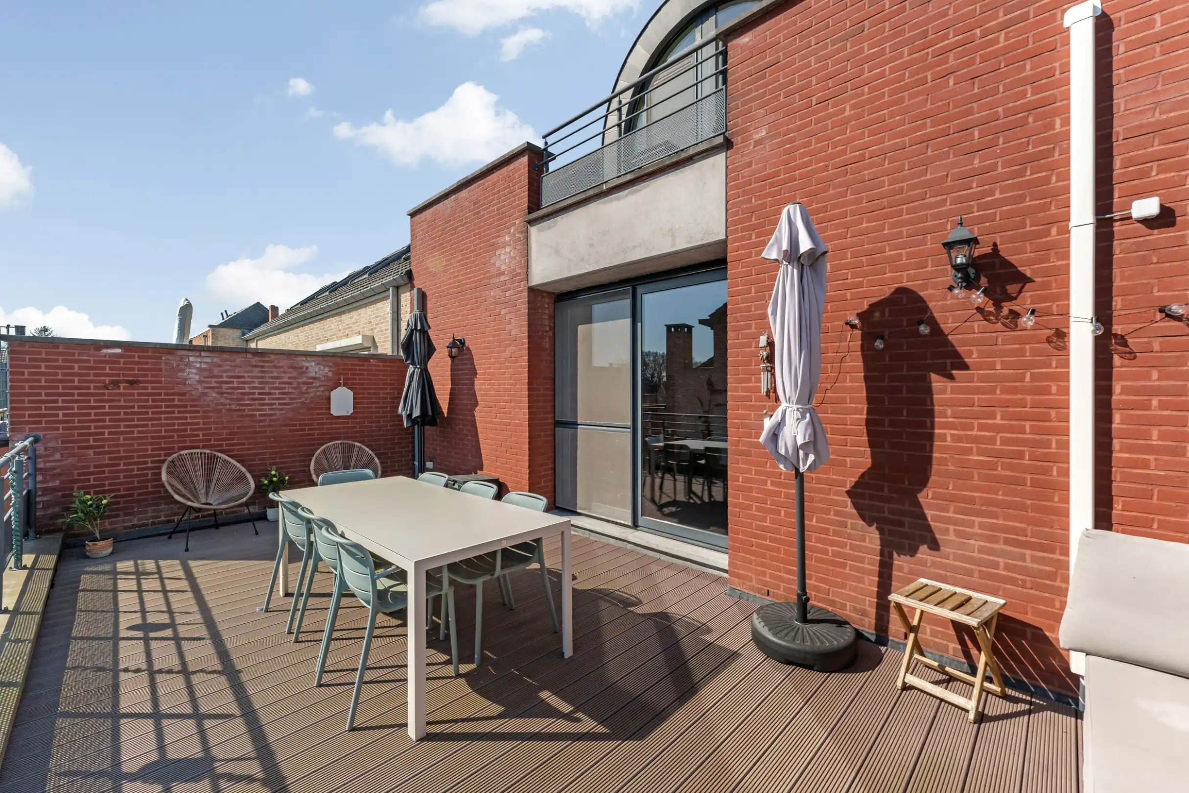 Zonnige bel-etage met dubbele garage en groot terras vlakbij het centrum van Heusden foto 7