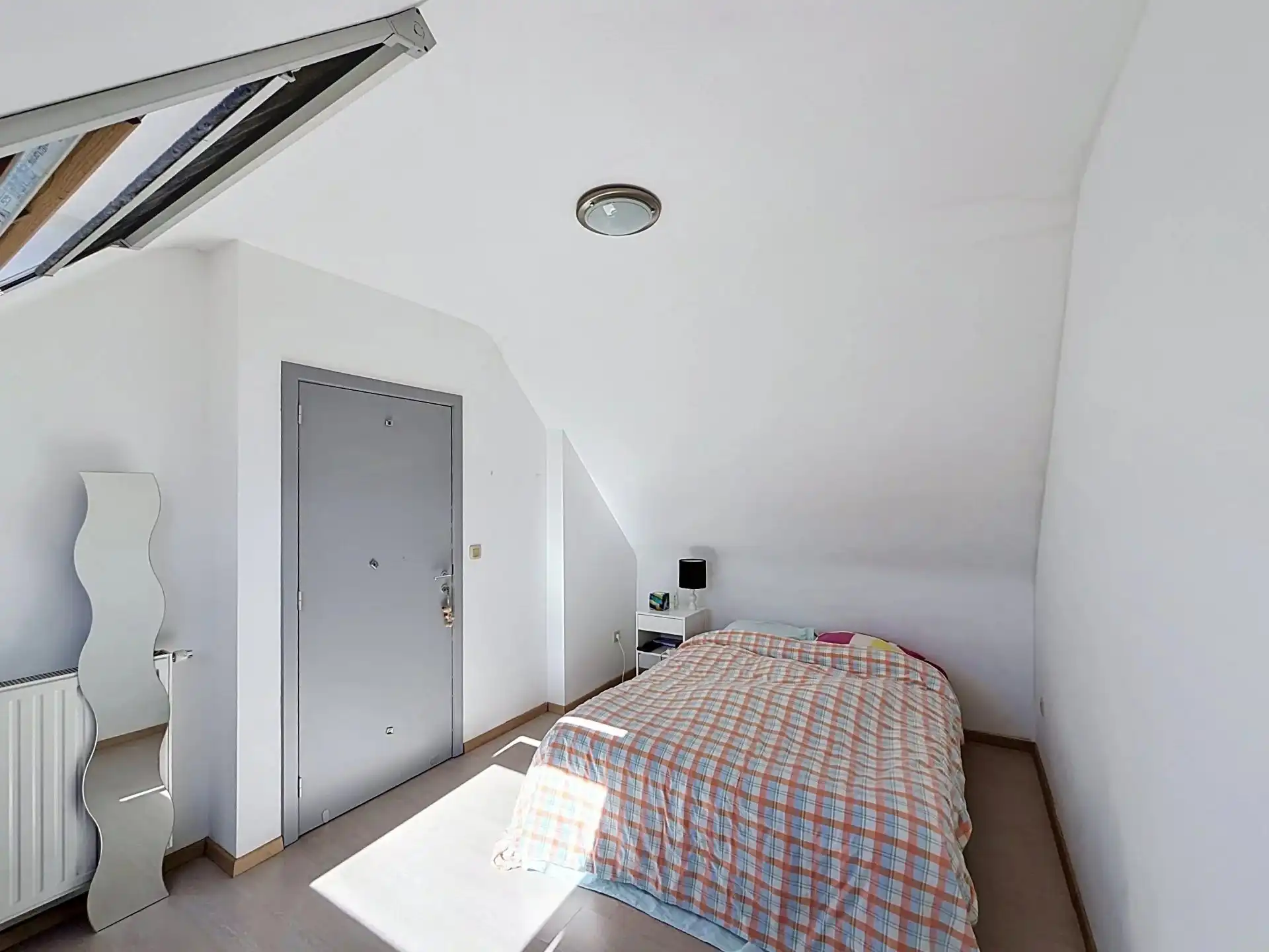 Duplex appartement met 2 slaapkamers, 2 terrassen en ondergrondse staanplaats en berging. foto 9