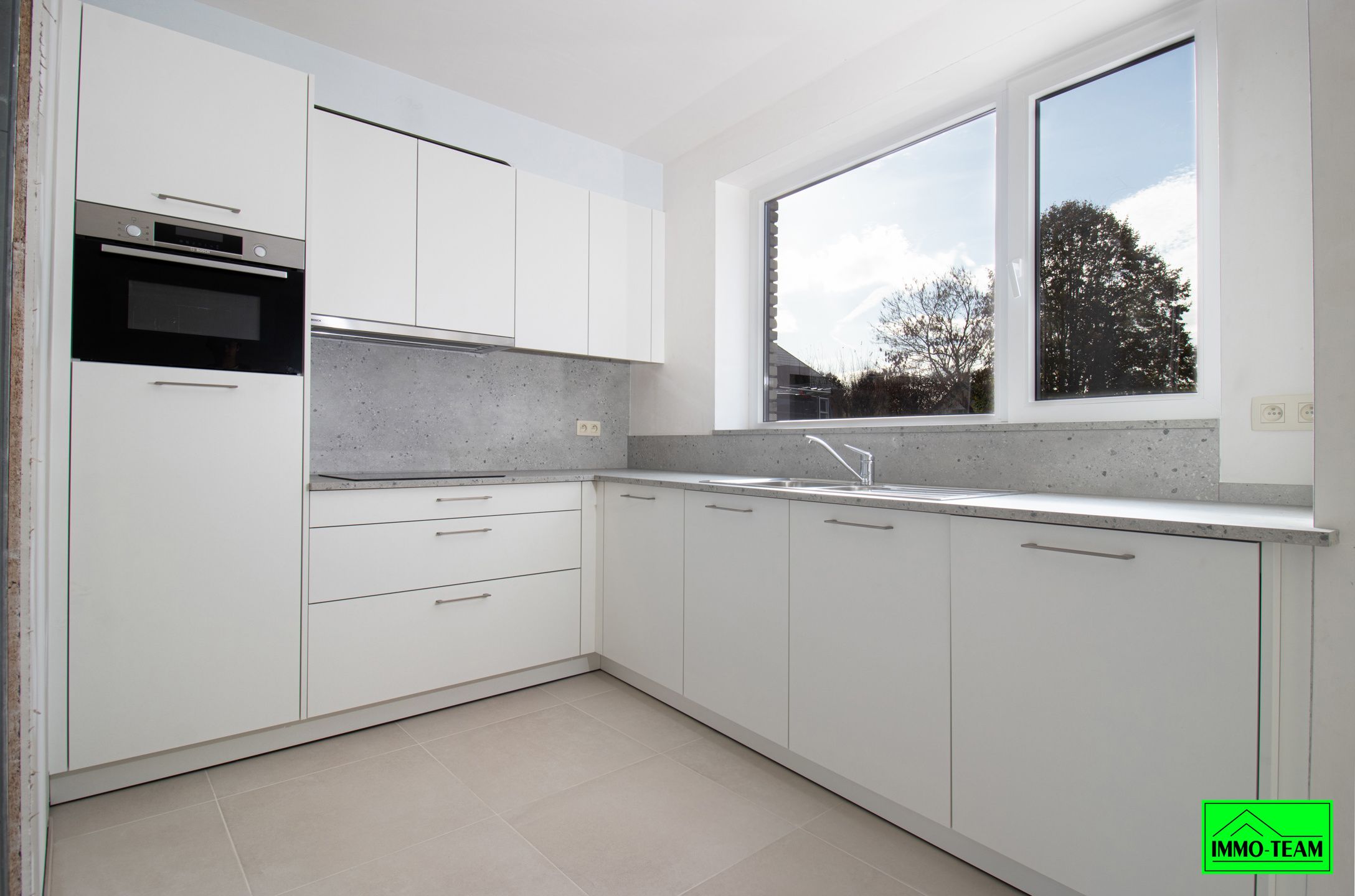 Nieuwbouw gelijkvloers appartement met terras en garage.  foto 11