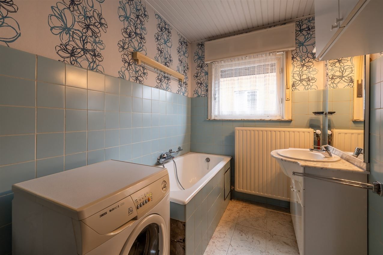 Te renoveren woning met 4 slk. in het hart van Averbode foto 18
