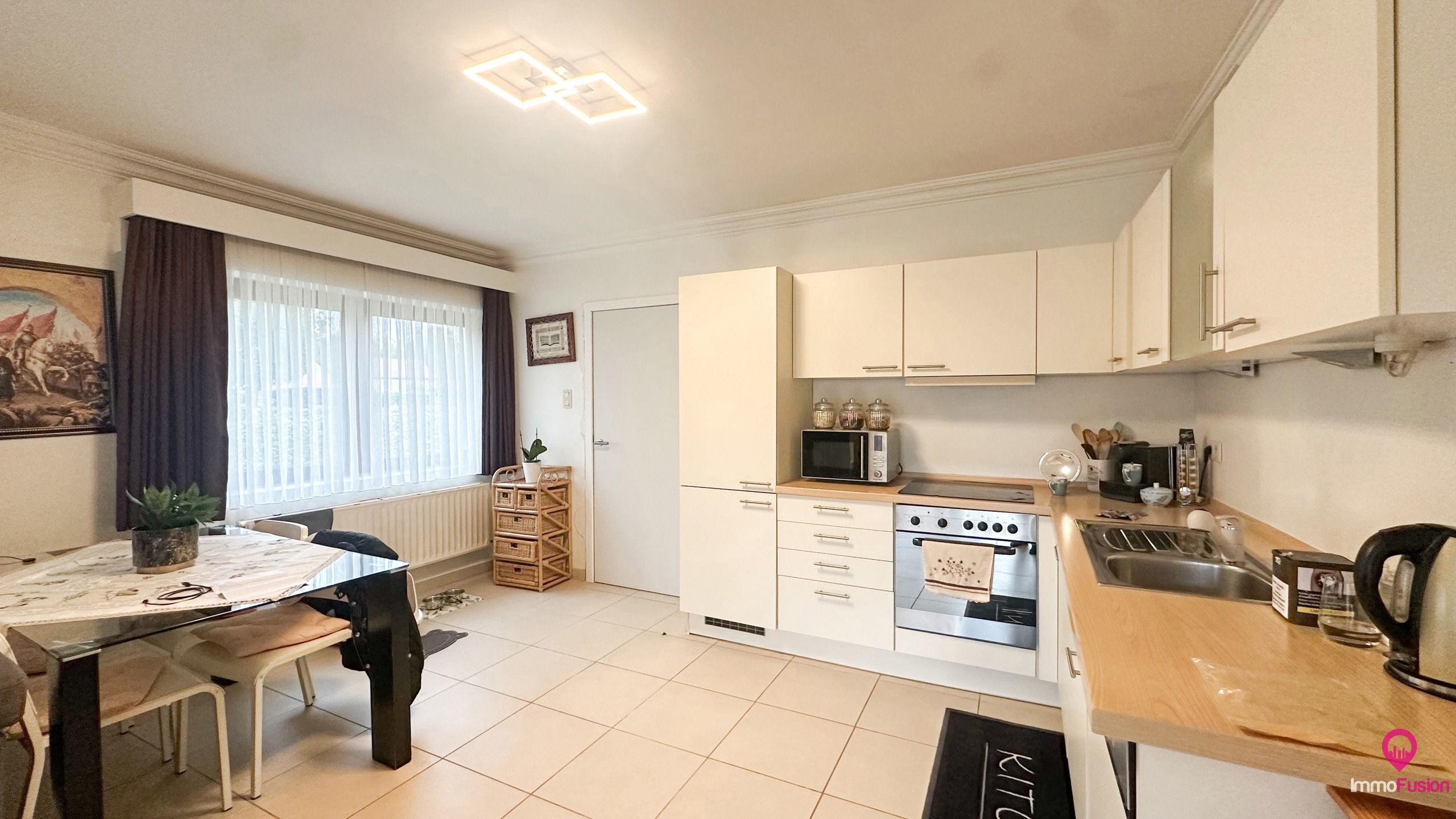  Handelspand met gerenoveerd appartement en kangoeroewoning! foto 8