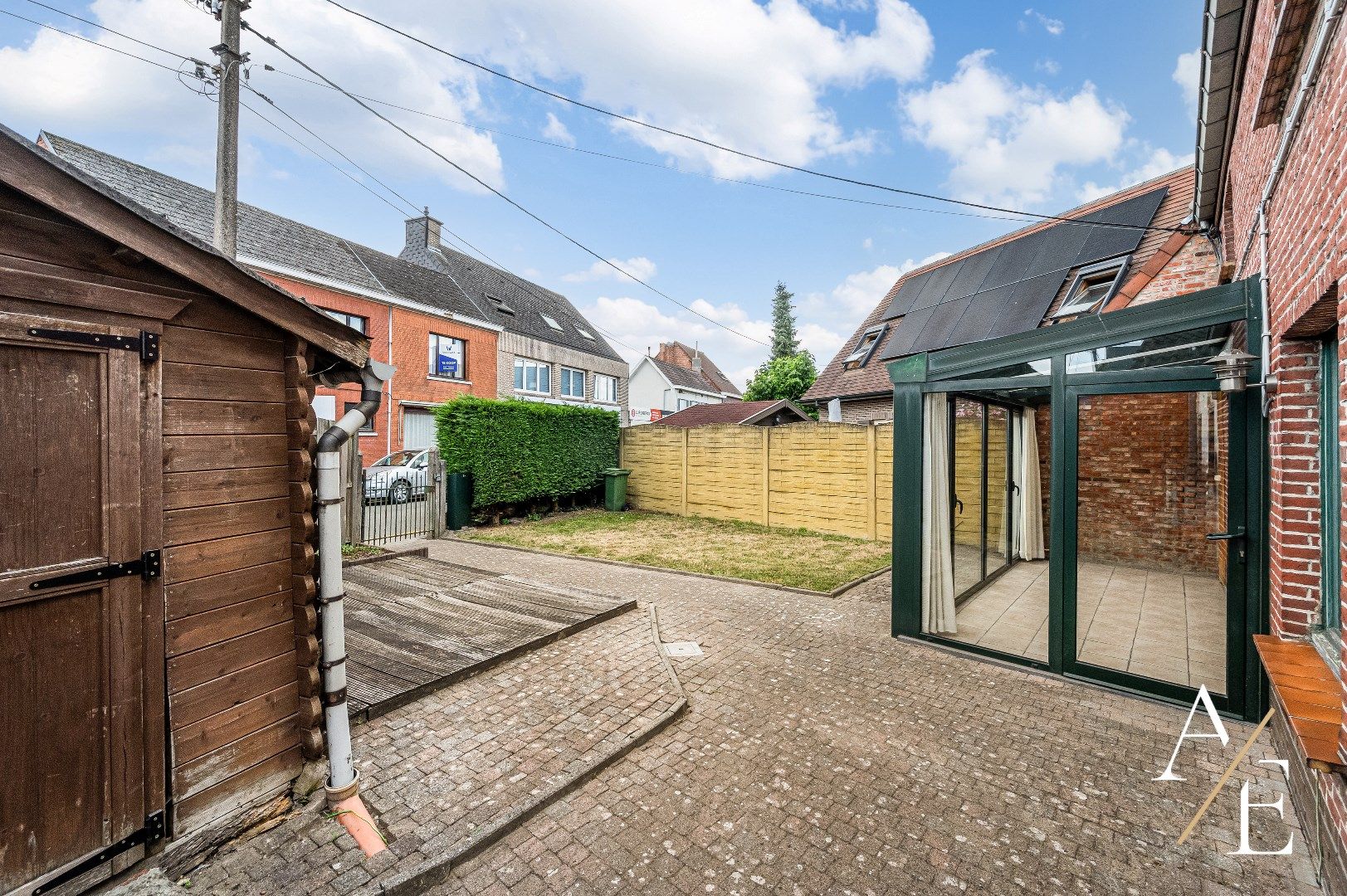 BERLARE - Te renoveren woning met tuin/parking/garage. foto 2