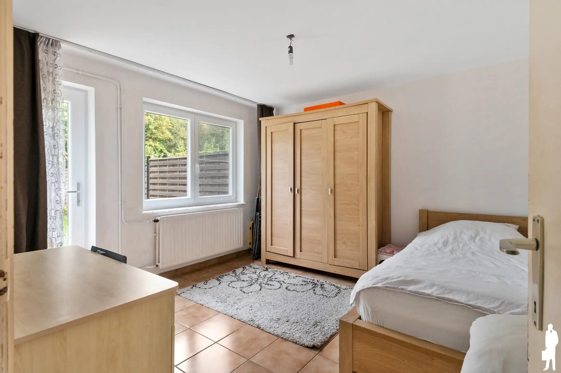 Ruime bel-etagewoning met 4 slaapkamers, garage en tuin foto 10