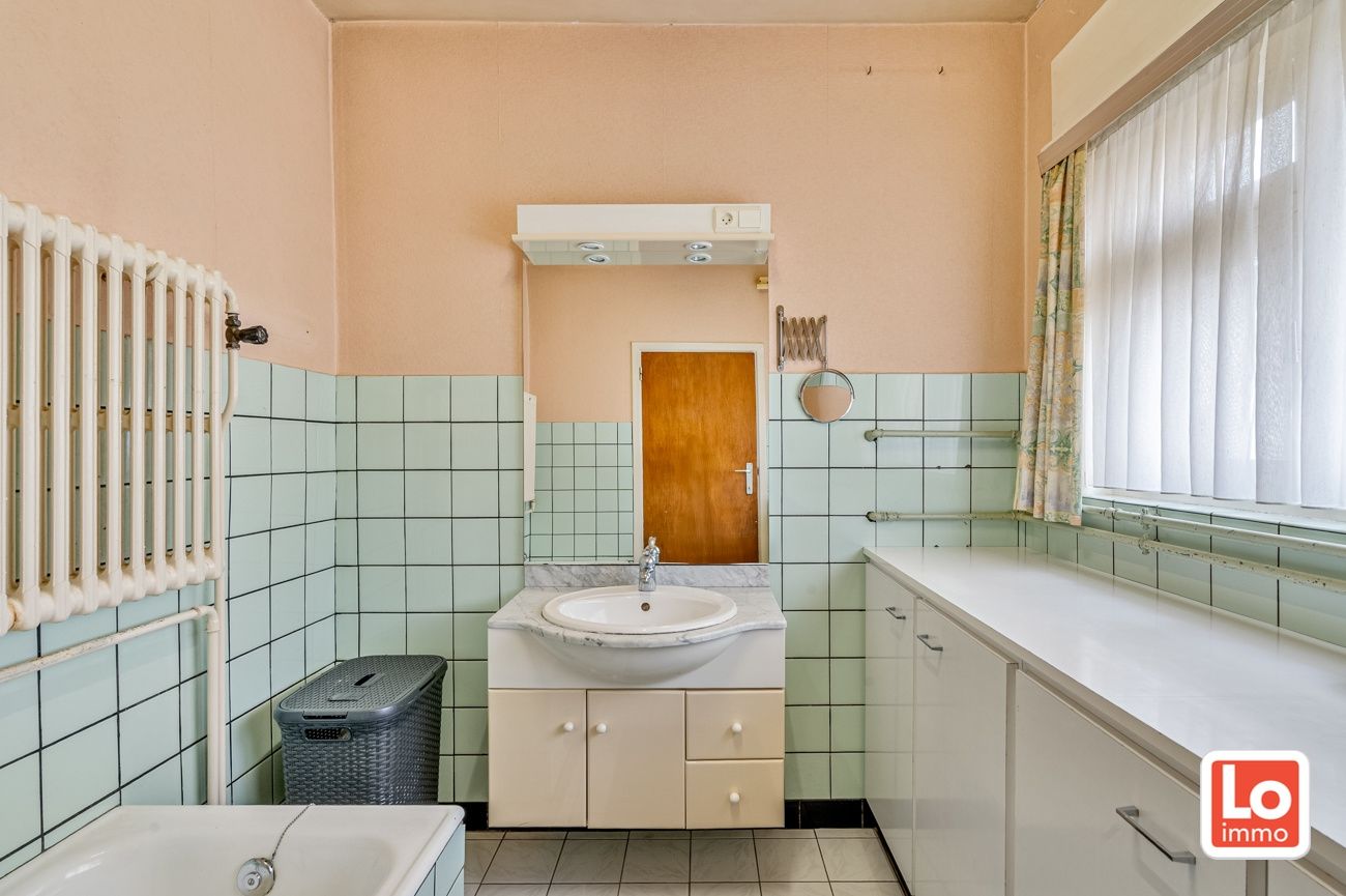 VERKOCHT! Charmante open te renoveren woning met garage en grote tuin op een goed bereikbare locatie tussen Lochristi en Oostakker! foto 12