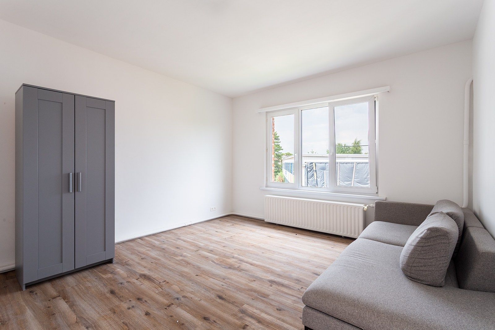 Licht en ruim appartement in rustige straat foto 11
