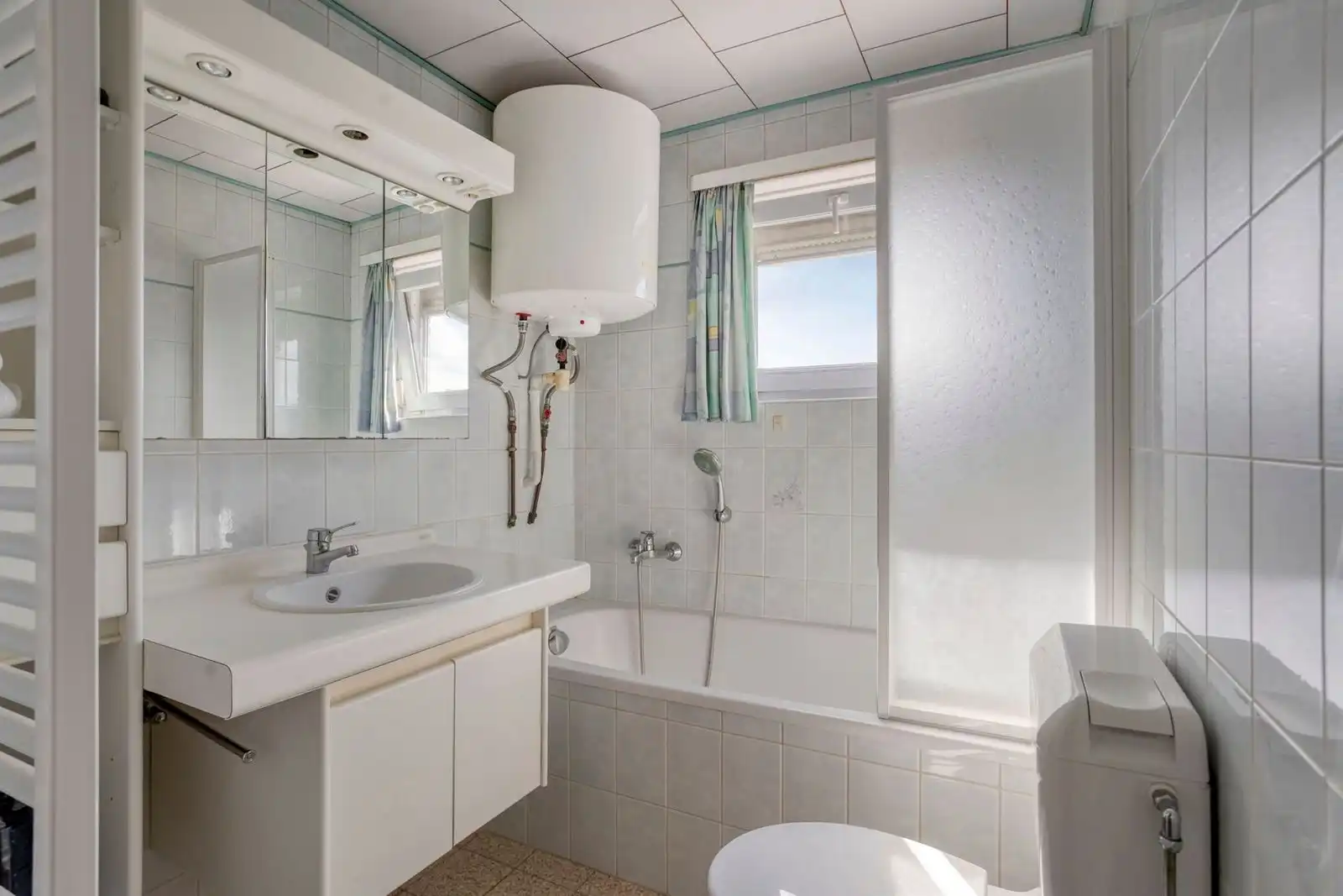 3-gevelwoning met 3 slaapkamers, garage en tuin foto 15