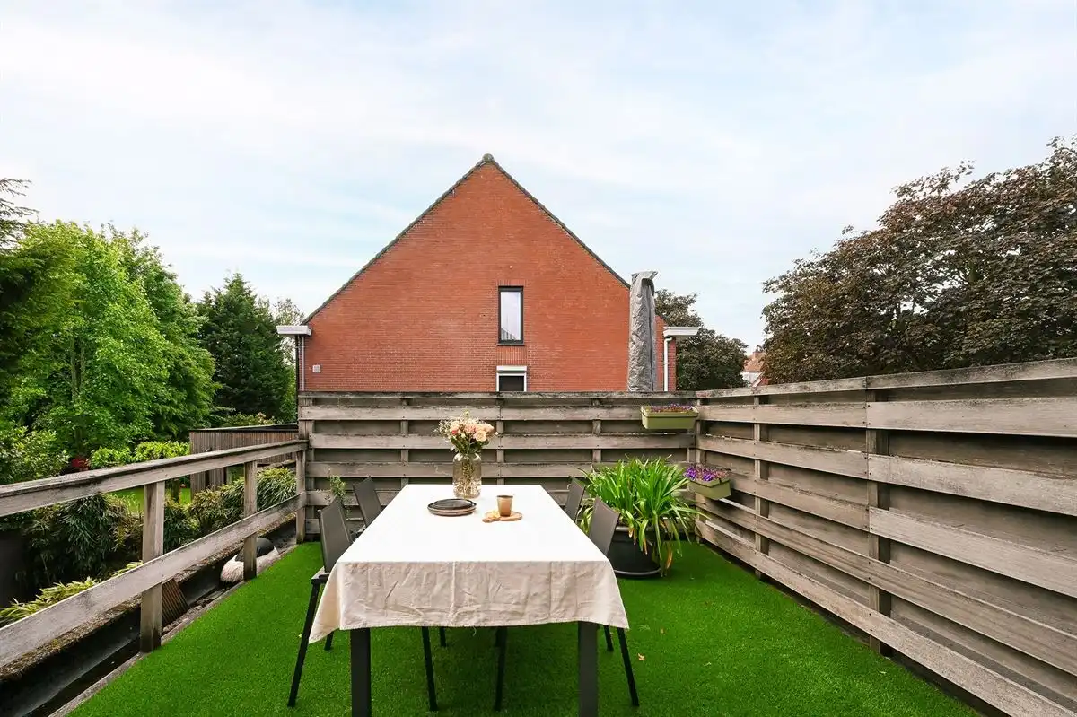 Mooi hoekappartement met garage foto 22