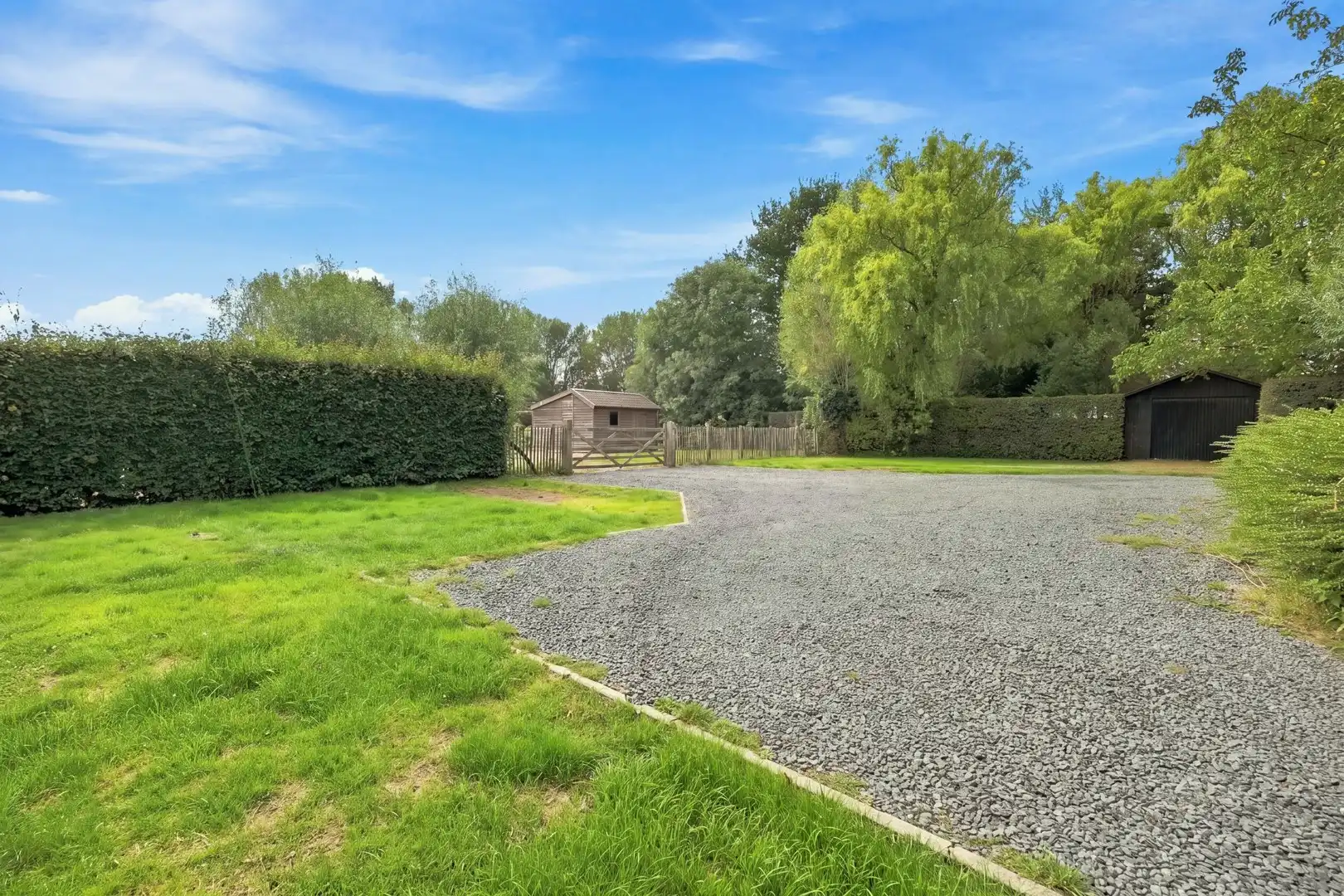 Karaktervol interbellum huis met bijgebouw én bouwgrond op 7.782 m² foto 8