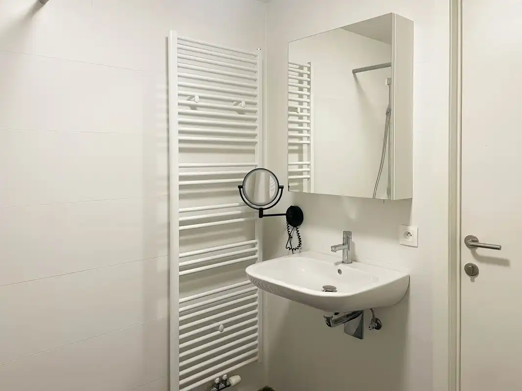 service flat met 1 slaapkamer en tuin + mogelijkheid tot parkeerplaats foto 9