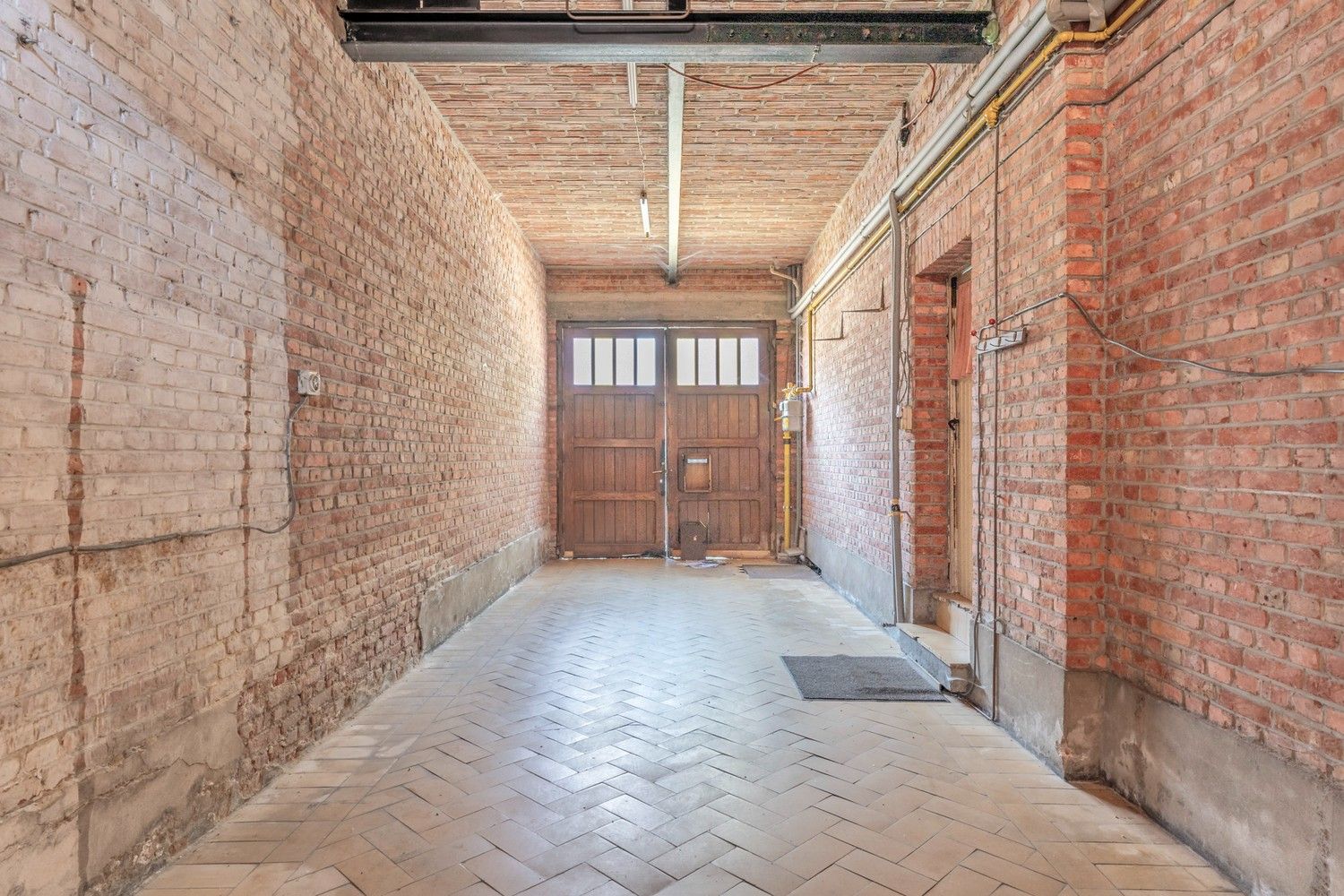 Karaktervol handelshuis met binnentuin in centrum Diepenbeek foto 22