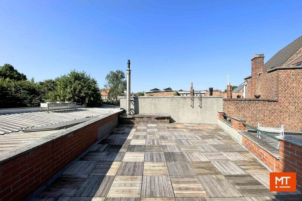 Veelzijdig gebouw bestaande uit handelsruimte, woning en appartement in het centrum van Wervik foto 24