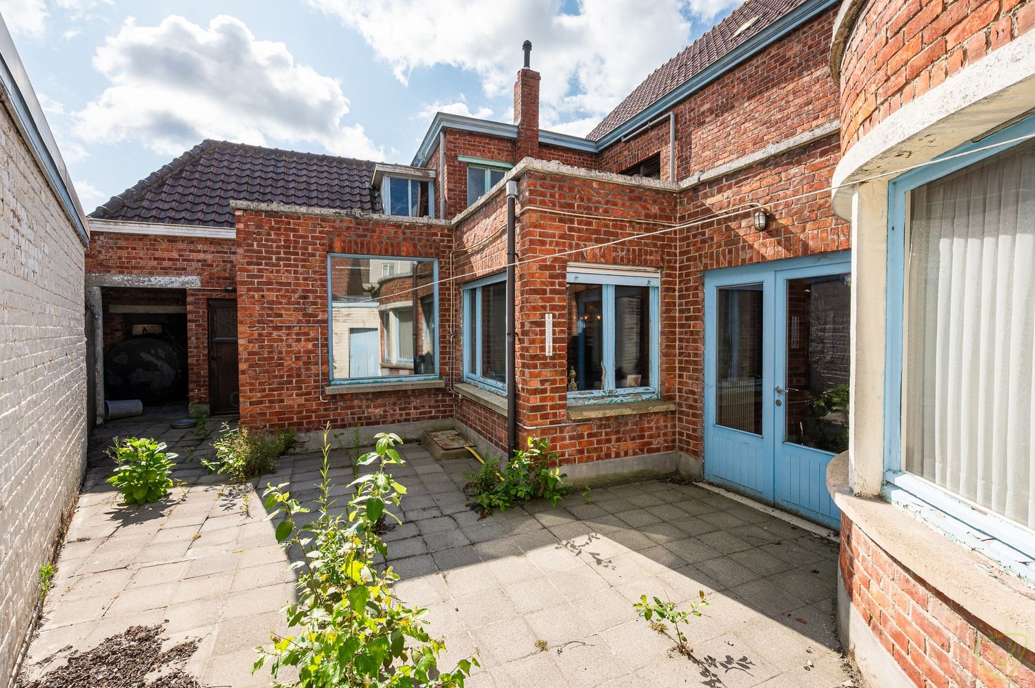 Woning met winkelruimte te koop in het centrum van Ursel foto 10