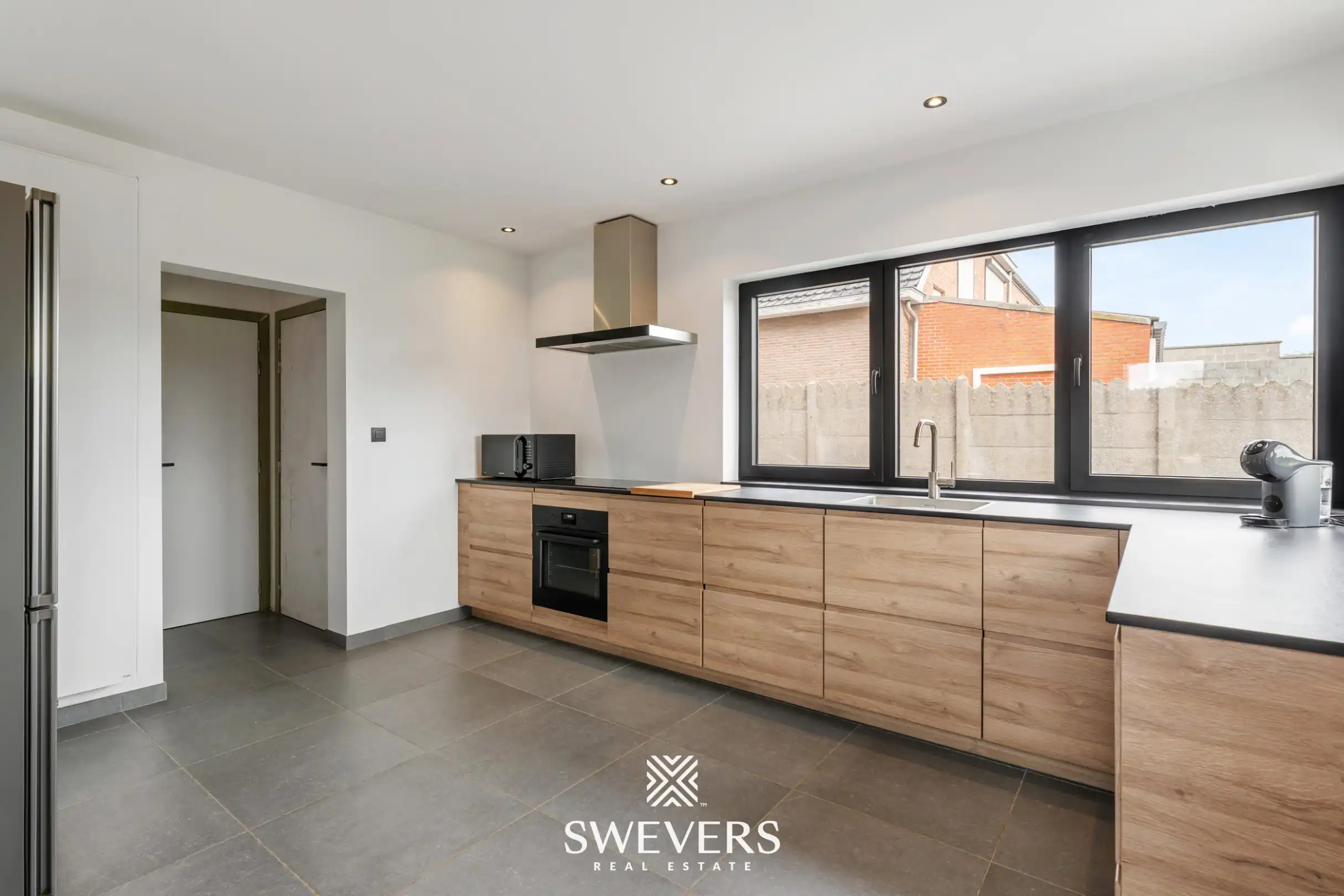Instapklare halfopen woning op 800 m² met tuin grenzend aan natuurreservaat" foto 12