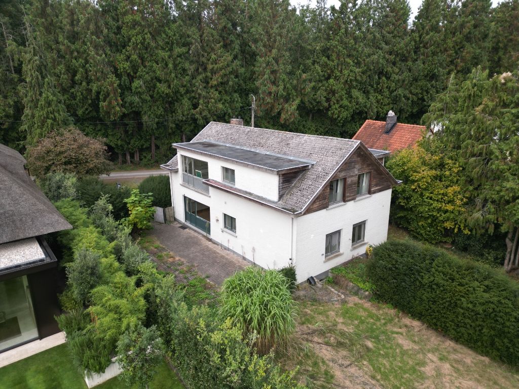 Bijzondere opportuniteit! Opbrengsteigendom bestaande uit twee te renoveren of herop te bouwen appartement foto 5