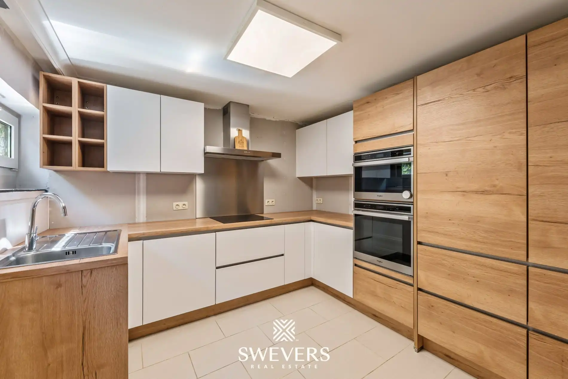 Vierkantshoeve met 2 woonentiteiten, 11 slpk. en 617 m² woonruimte foto 43