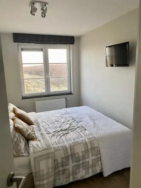 Prachtig Hoekappartement met Panoramisch Zee- en Duinenzicht foto 6