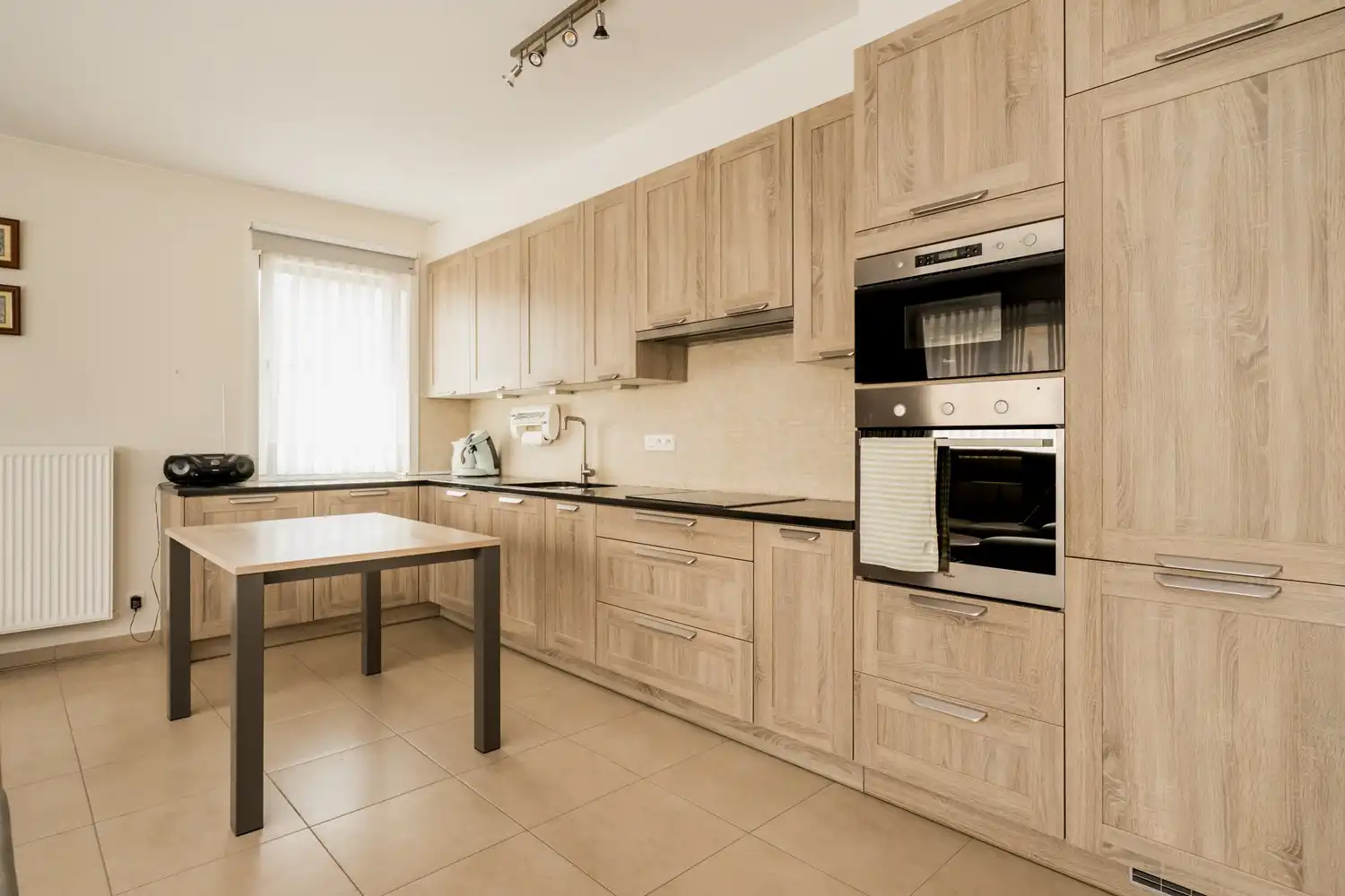 Lichtrijk hoekappartement in recent gebouw foto 7