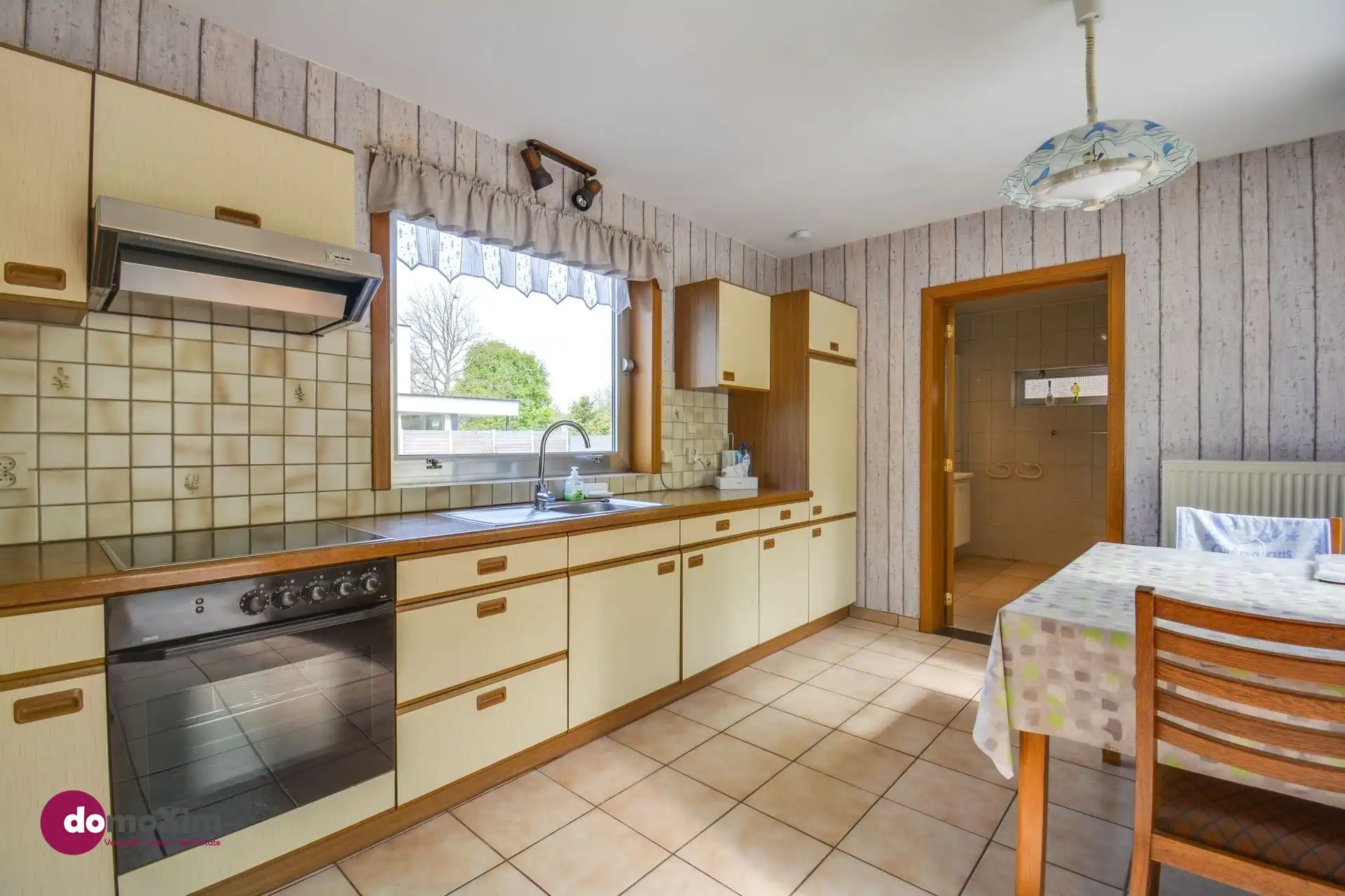 Te renoveren woning op bereikbare locatie in Boortmeerbeek foto 7