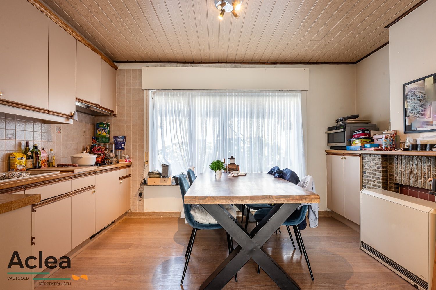 Verzorgde woning met 2 zeer ruime slpks en bureauruimte foto 3
