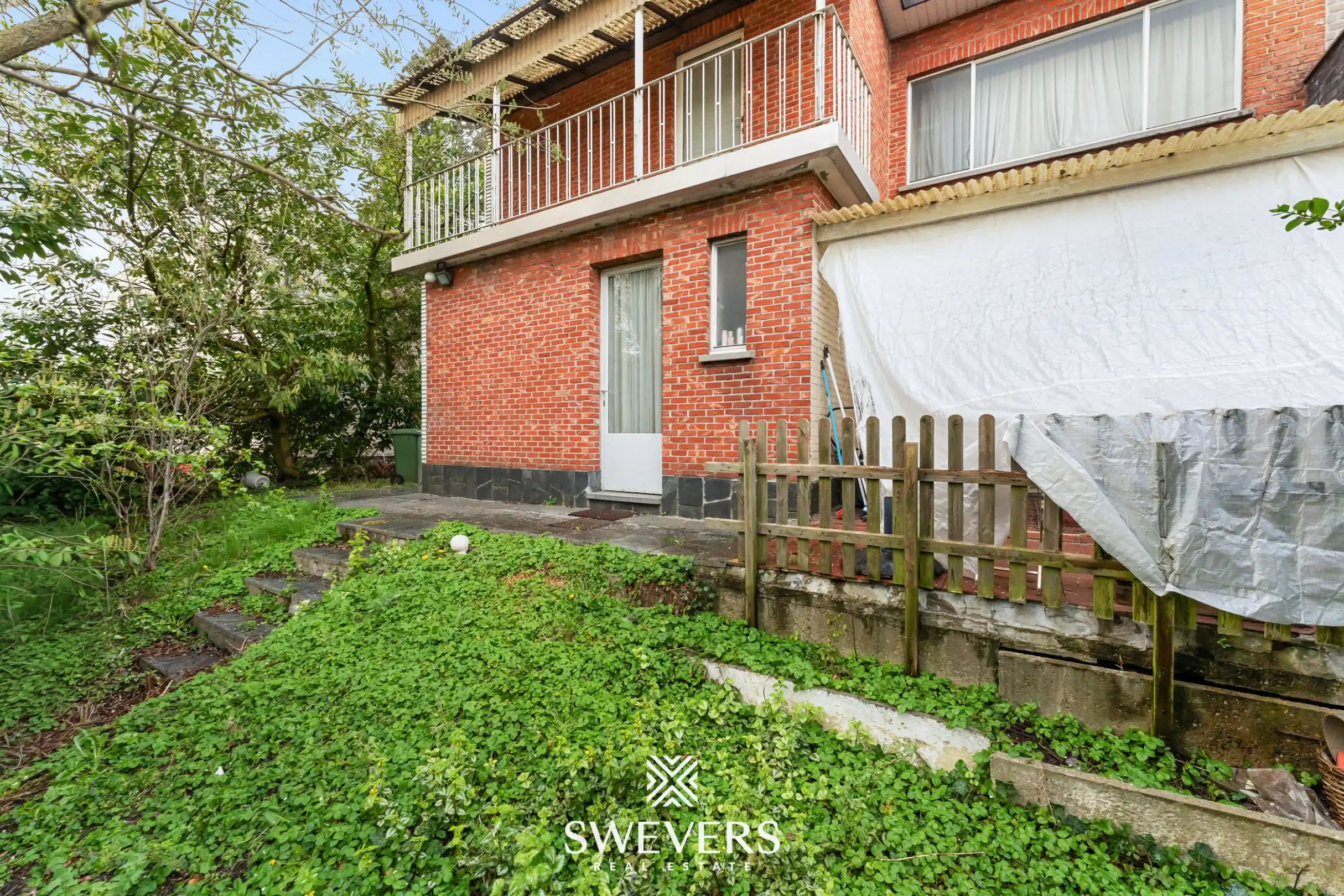 Ruime halfopen bebouwing met 4 slaapkamers en veel renovatiepotentieel op topligging in Hasselt foto 23