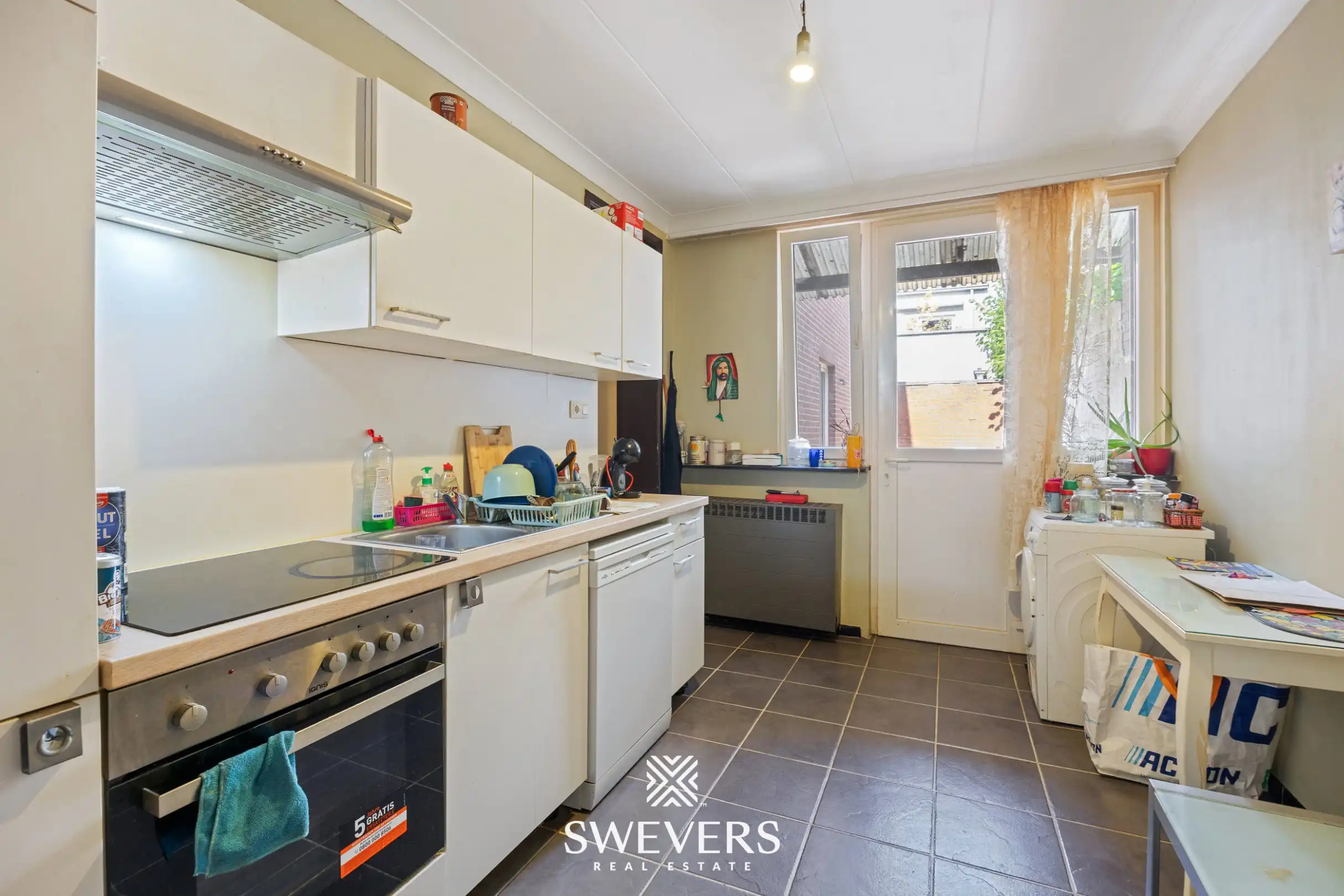 Gerenoveerd investeringspand met 2 verhuurde appartementen te Leopoldsburg foto 10