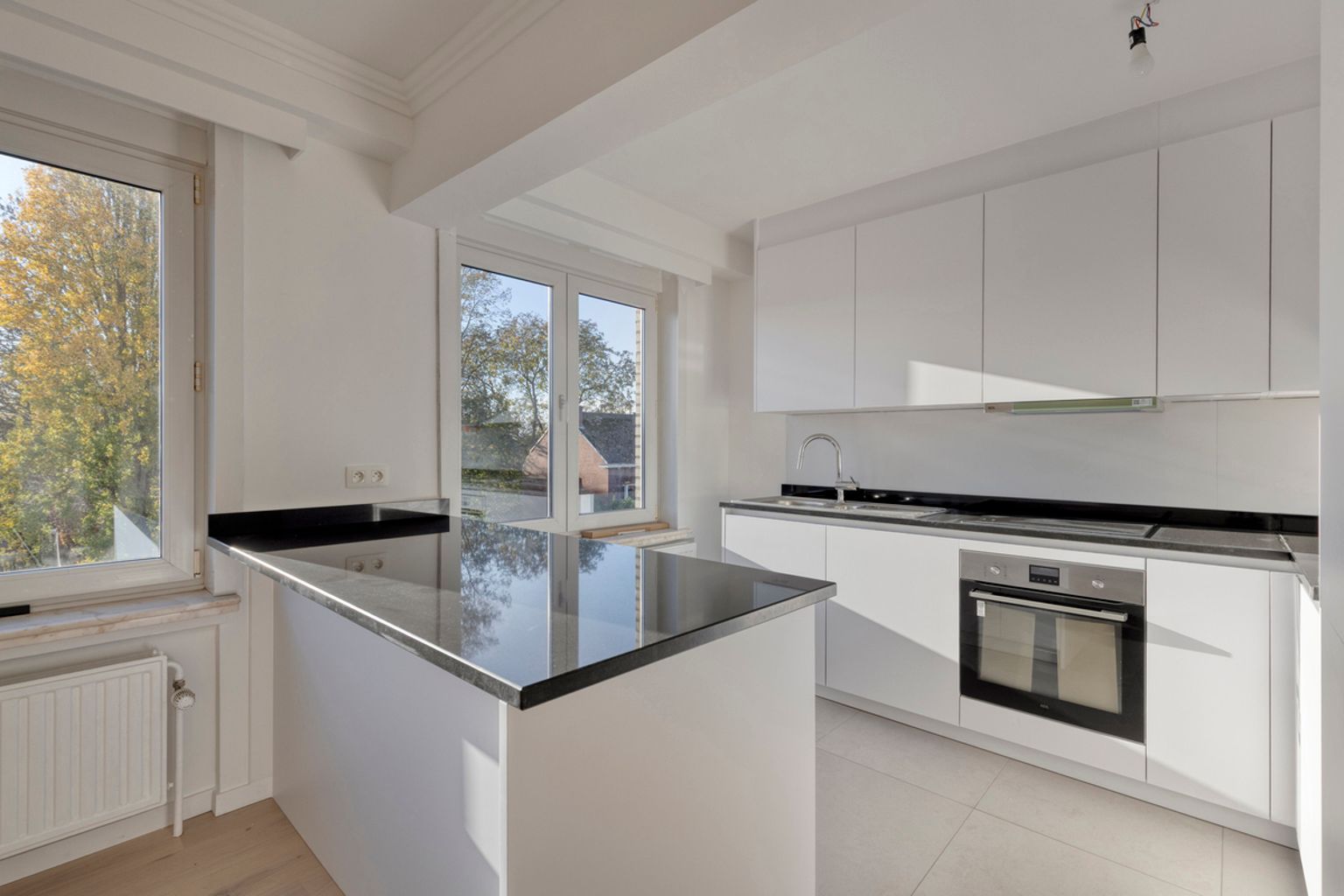 Volledig gerenoveerd en instapklaar 2 slaapkamer appartement foto 8