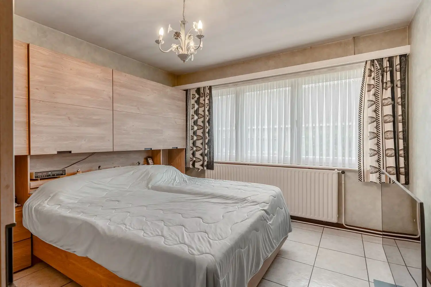 Zeer goed onderhouden en instapklare woning met drie slaapkamers, gezellige stadstuin en achter gelegen garage te Wijgmaal ! foto 13