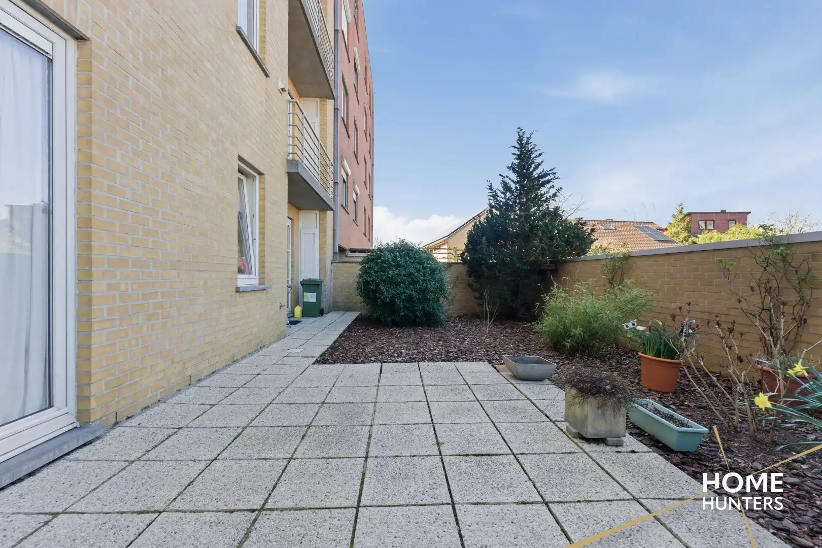 Instapklaar gelijkvloers appartement met 2 slaapkamers en ruime tuin foto 18