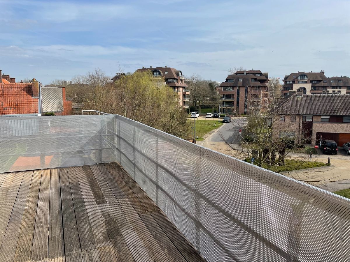 Exclusief één slaapkamer DAK-APPARTEMENT met ruim terras en openlucht autostandplaats foto 9
