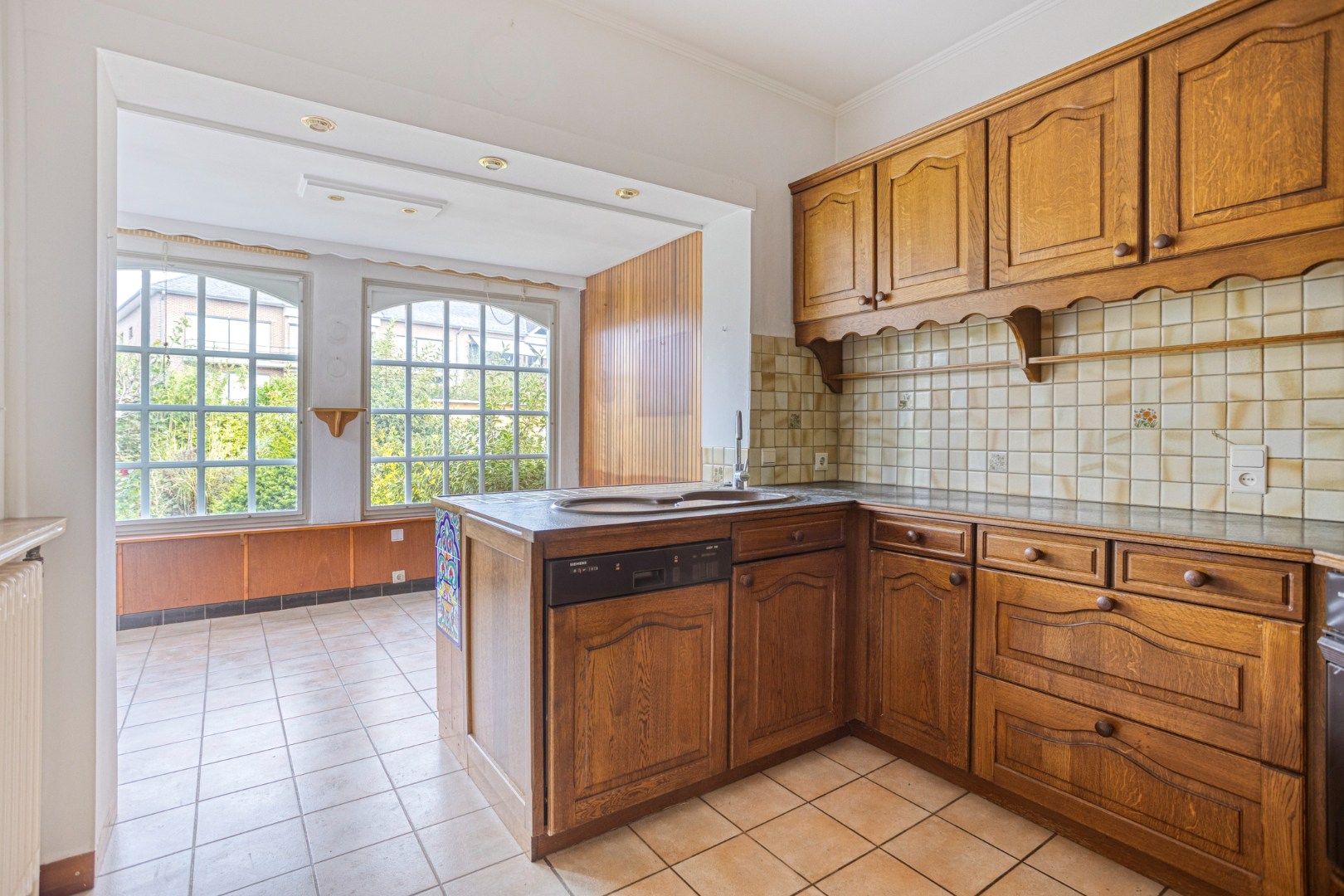 Halfopen bebouwing met 4 slaapkamers,  bureau en ruime tuin in Kessel-Lo - bewoonbare opp. 179 m²  foto 7