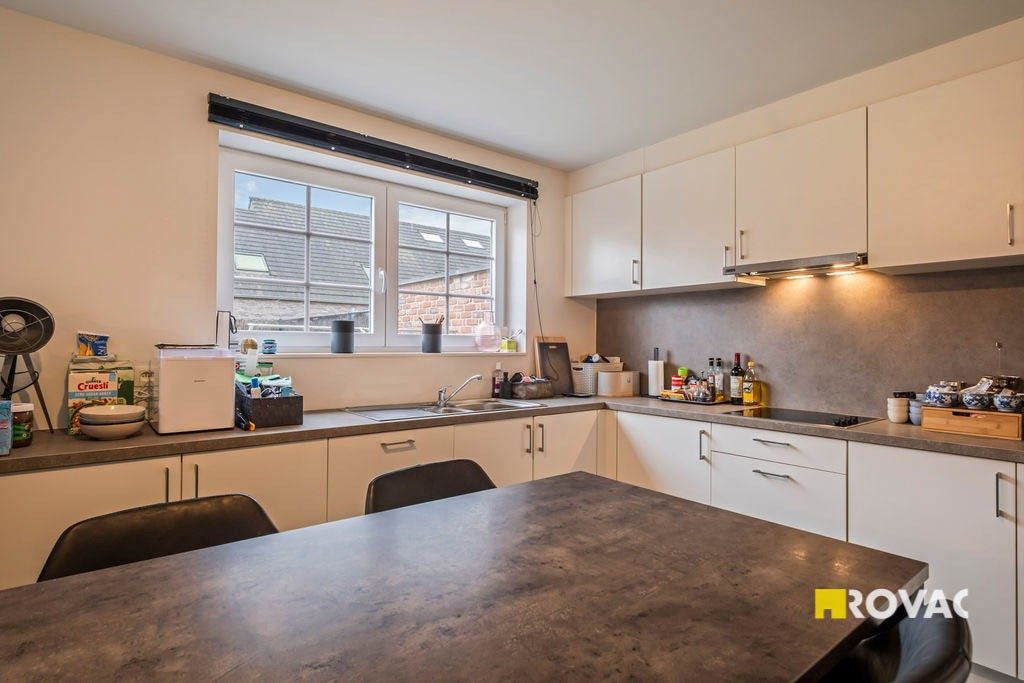 Zeer recente en ruime woning met 4 slaapkamers, garage en tuin foto 6