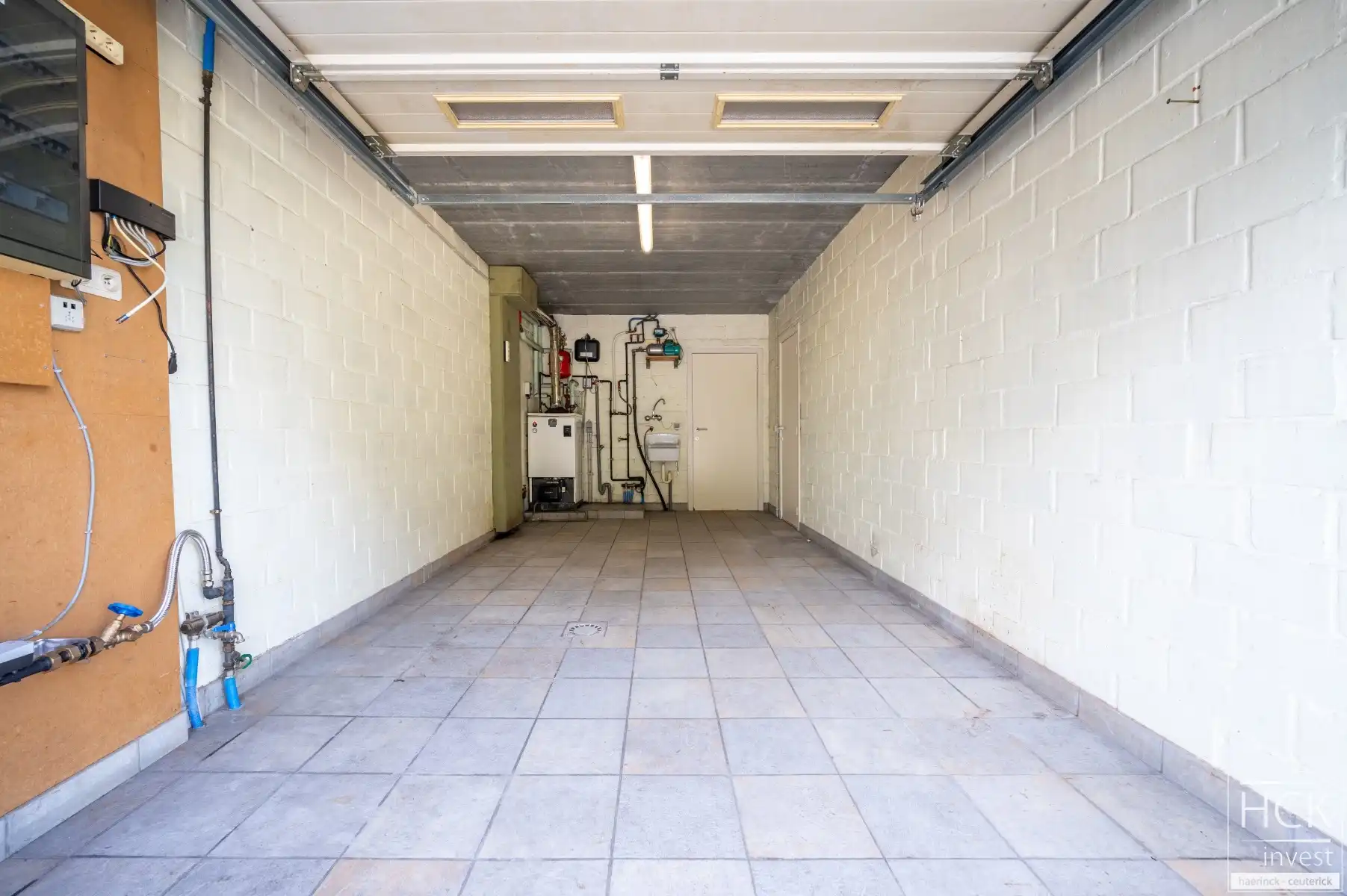 KRUISHOUTEM - Instapklare woning met 3 SLPK, garage én zonnige tuin foto 14