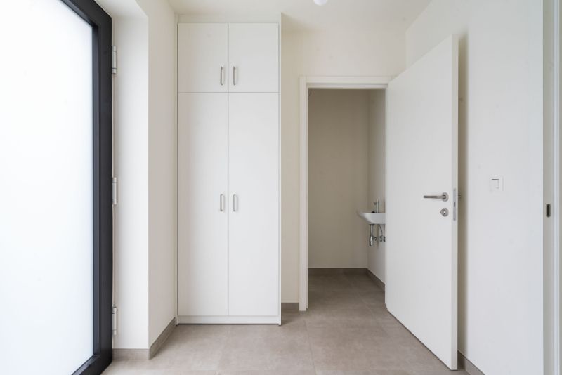 Dit appartement is gelegen langsheen de Langerbrugsestraat te Evergem. foto 5