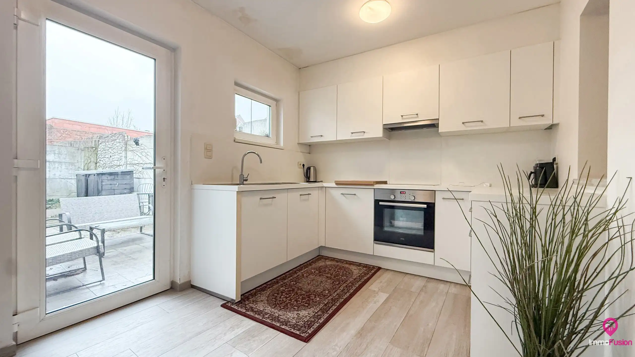 Instapklaar gelijkvloers appartement in Heusden! foto 2