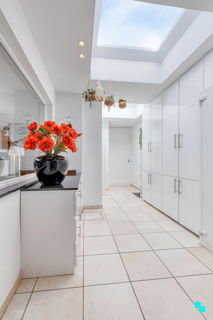 Woning met uitbreidingsmogelijkheden en gezellige tuin in het hart van Merelbeke foto 13