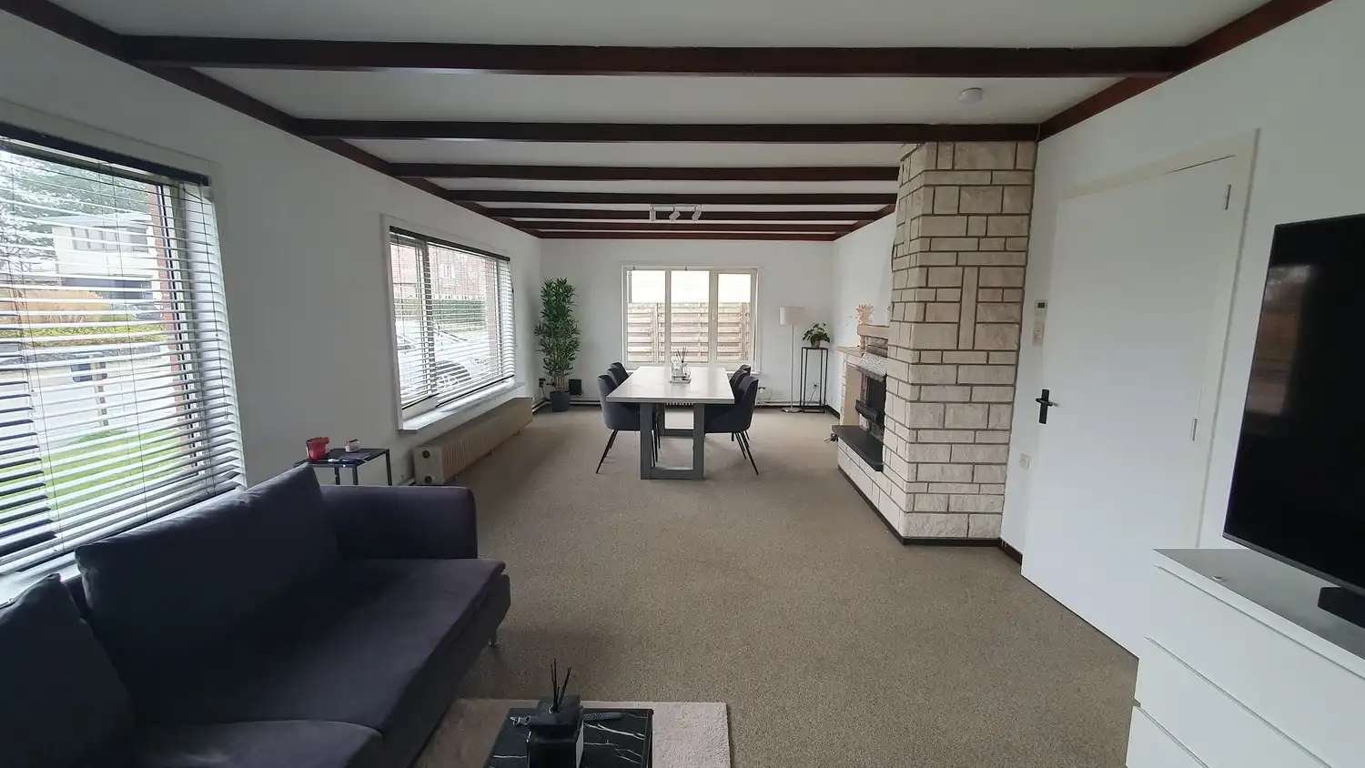 HOB gezinswoning met 4 slaapkamers en toffe tuin in Bree foto 2