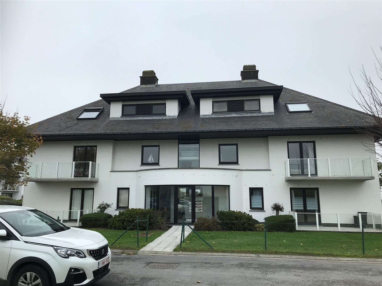 2 slaapkamerappartement te huur met garage foto 16