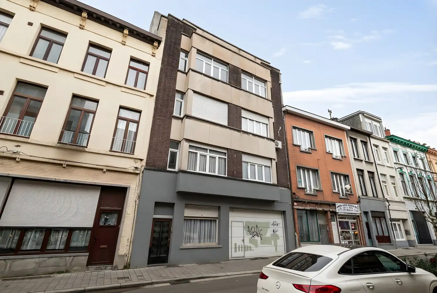 Opbrengsteigendom met een groot magazijn en 3 appartementen te koop! foto 33