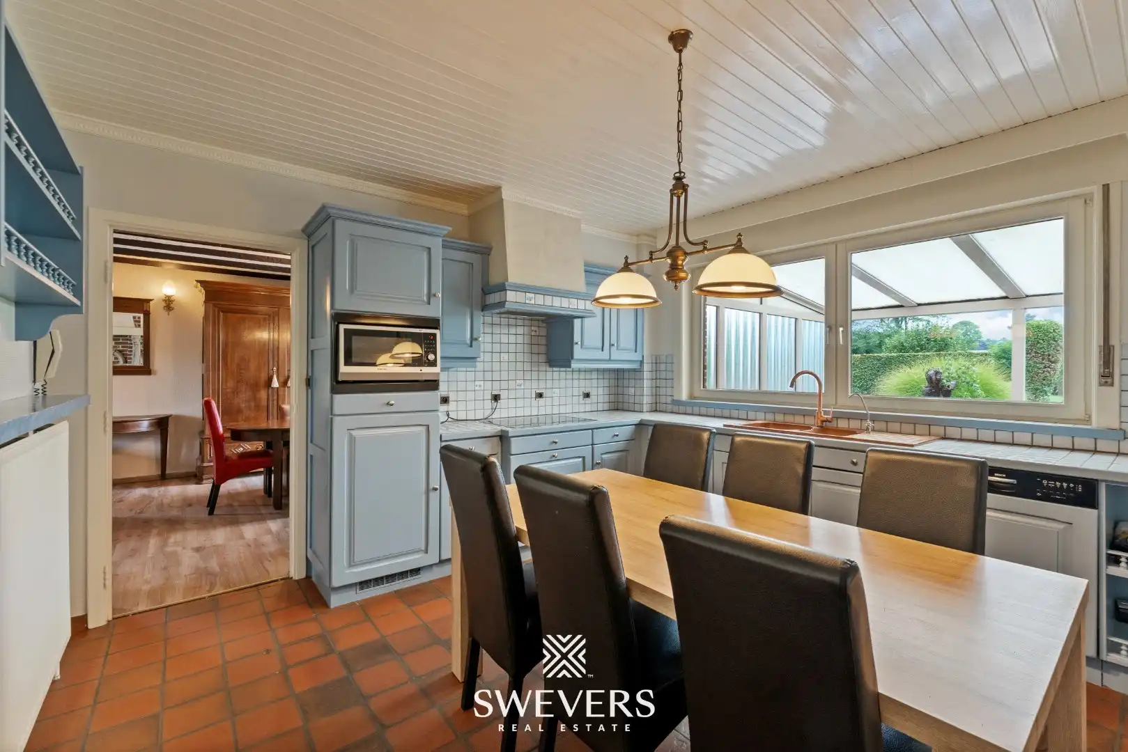 Karaktervolle gezinswoning met veel potentieel op een perceel van 13a55ca in hartje Heusden-Zolder foto 11