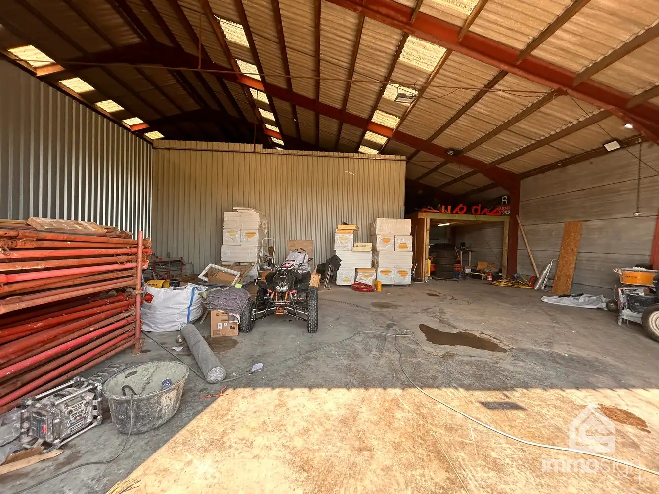 Loods van 180 m² ter opslag met grote automatische garagepoort te Bocholt! foto 5