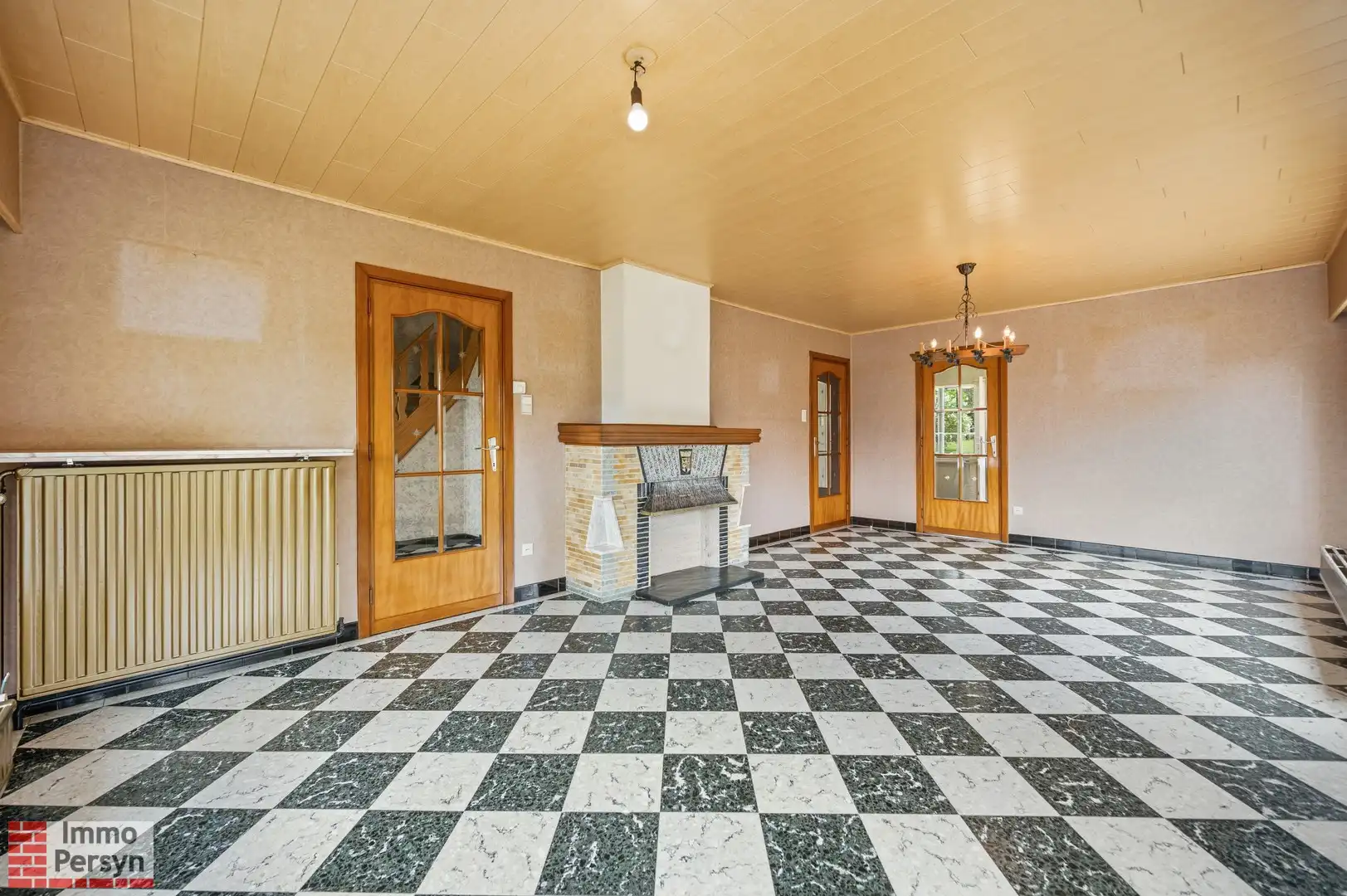 Karaktervolle renovatiewoning met achteruitweg te Messelbroek foto 4
