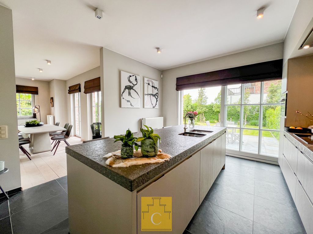 instapklare half open woning met garage en zonnige tuin foto 4