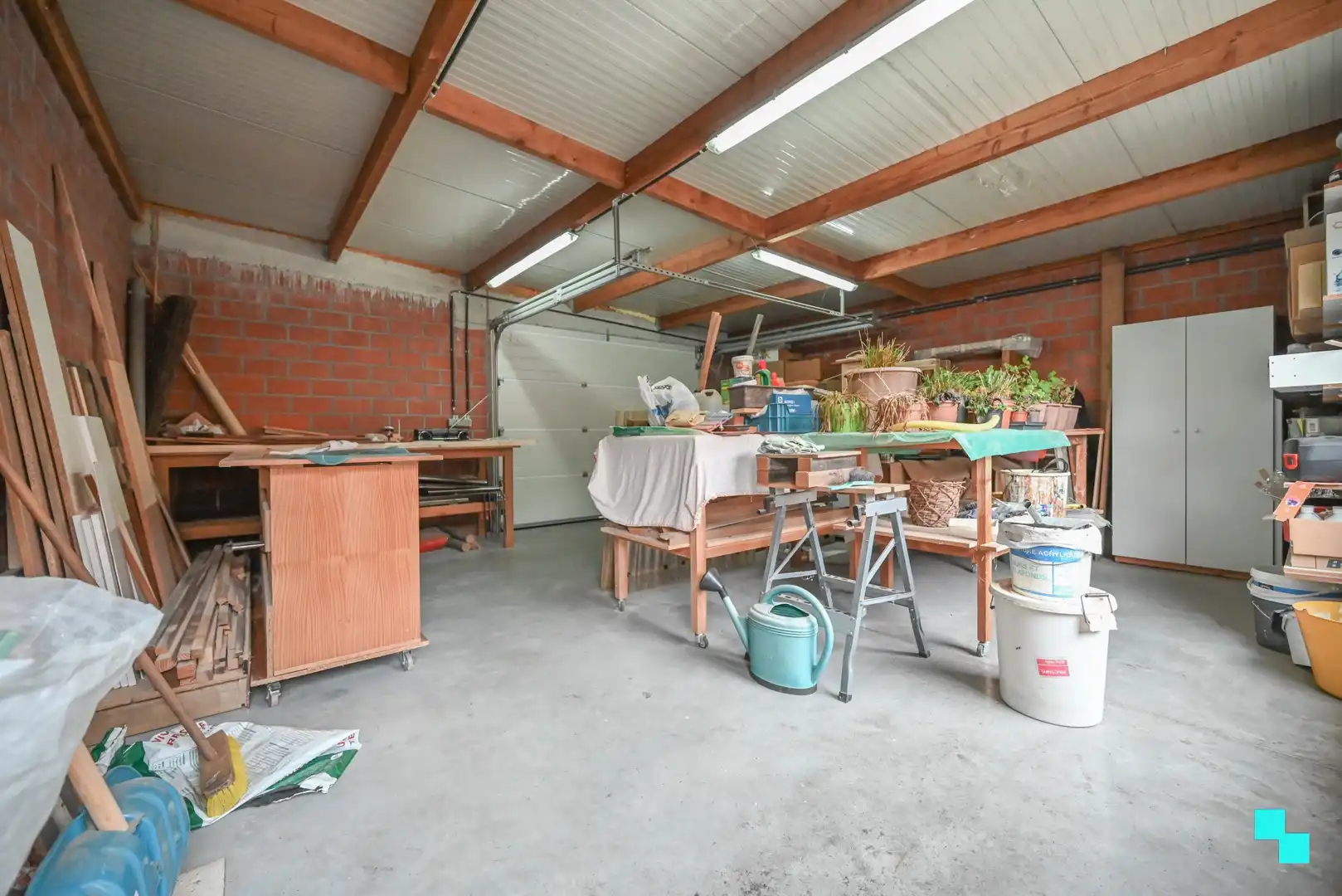 Handelswoning met garage en tuin foto 29