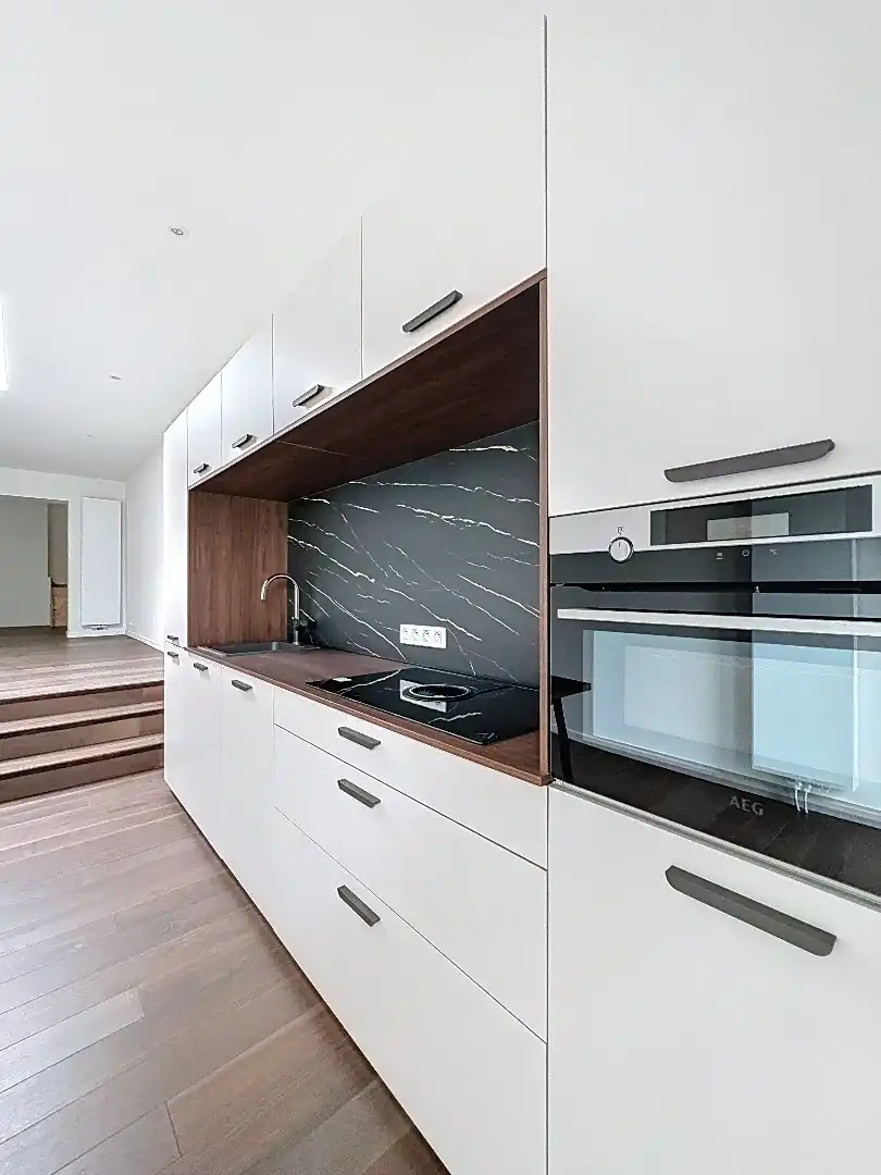 Elegant wonen in Tienen: gerenoveerde rijwoning met 3 slaapkamers en zuidwestgerichte tuin. foto 10