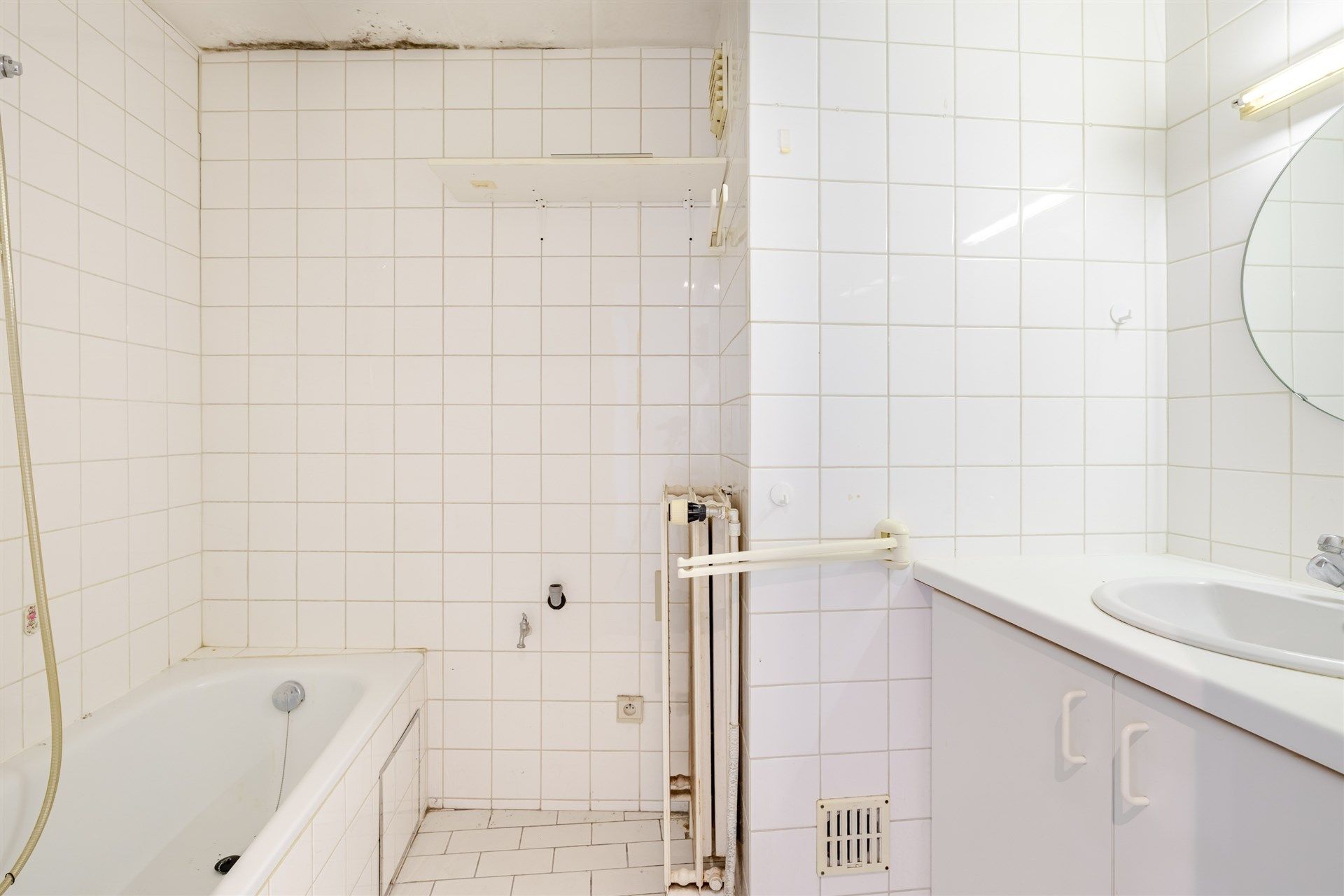 Opbrengsteigendom bestaande uit 4 appartementen + 22 garageboxen + magazijn/werkplaats foto 8